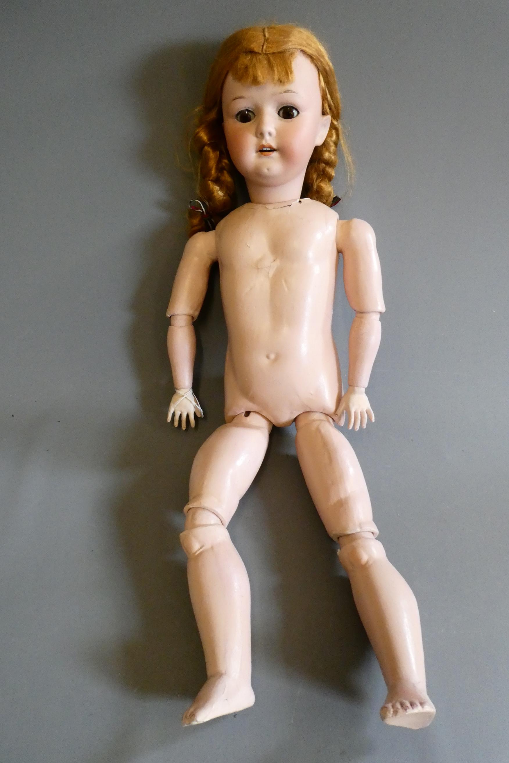 A large Heubach & Koppelsdorf bisque socket head doll Image