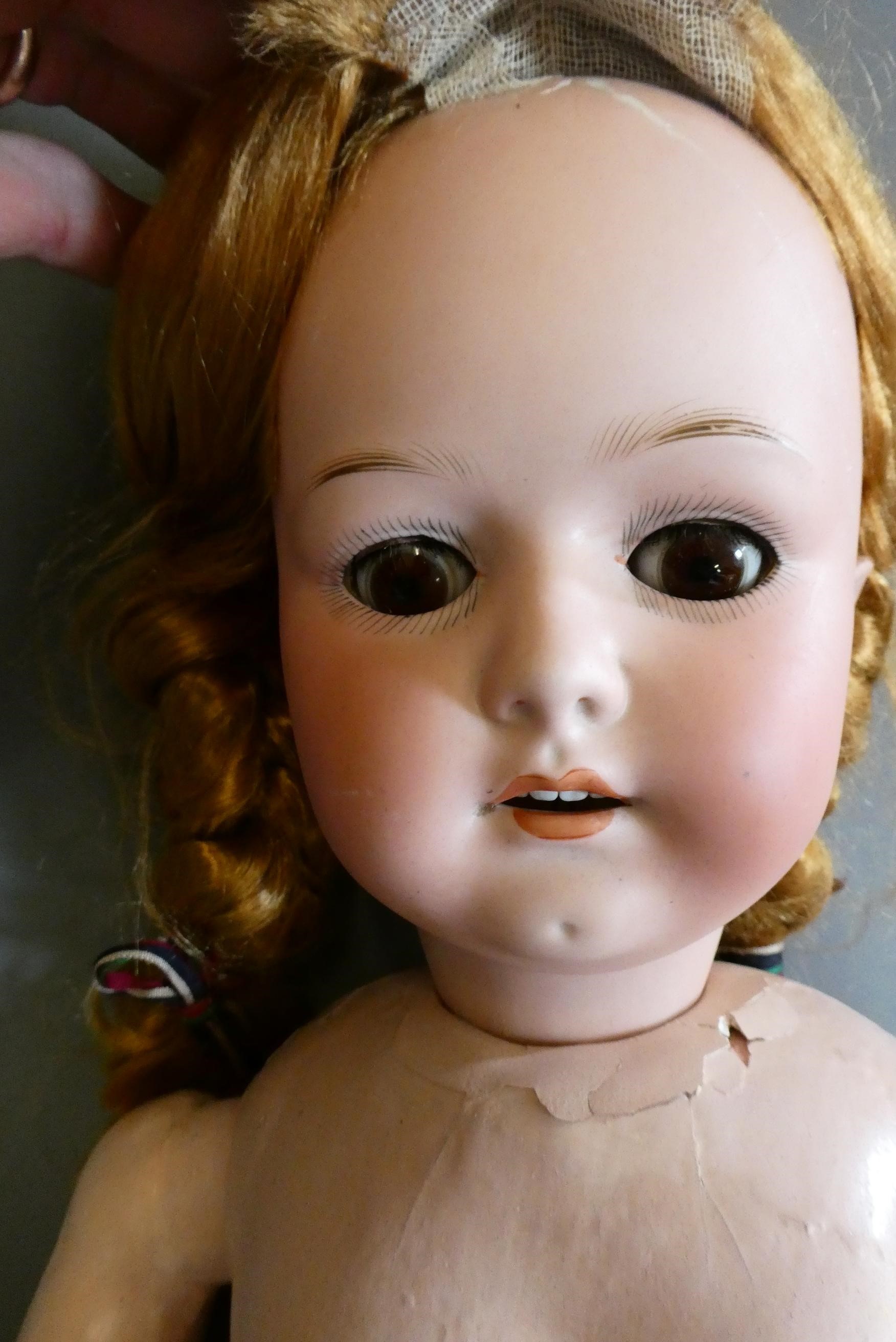 A large Heubach & Koppelsdorf bisque socket head doll Image