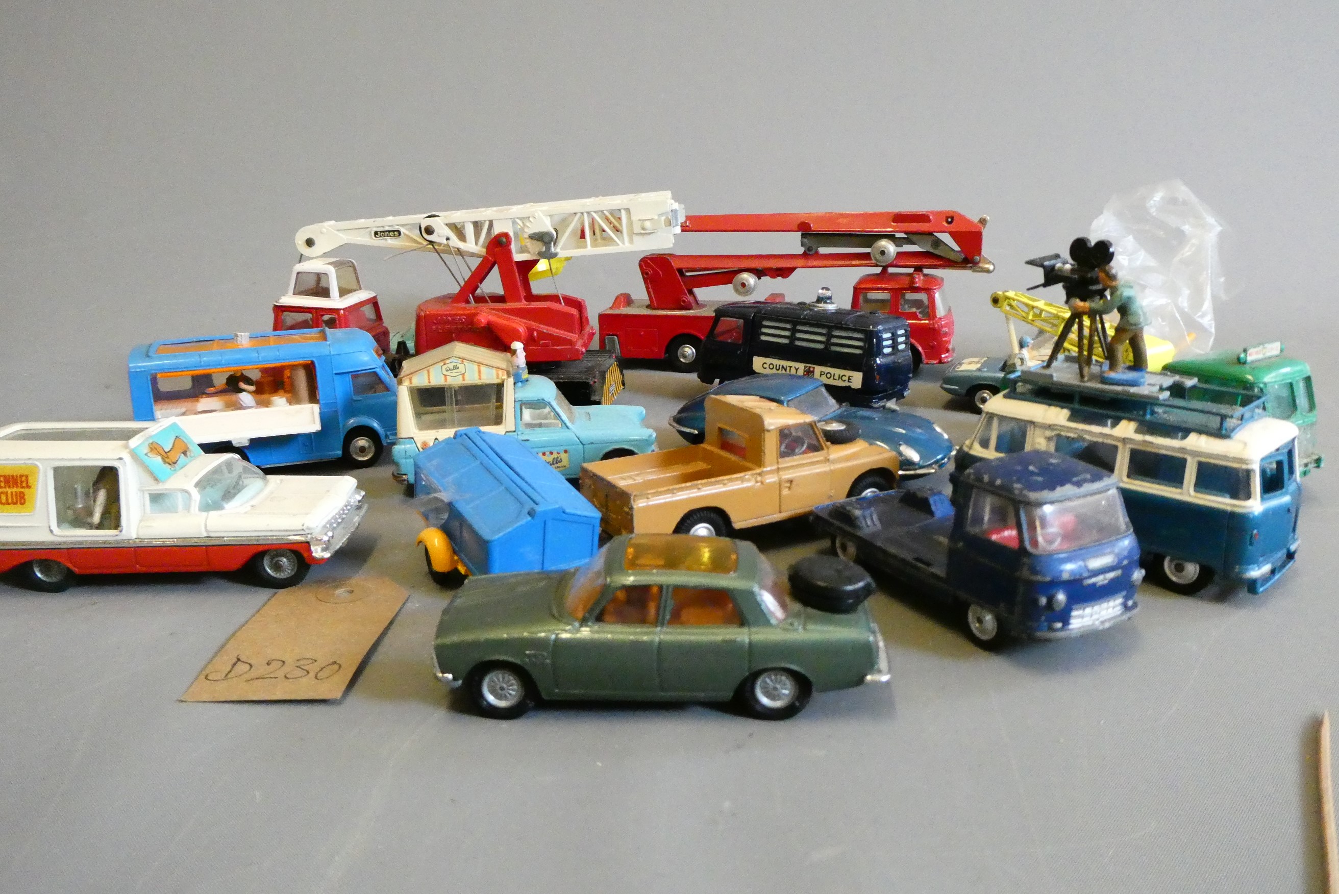 Unboxed Corgi vehicles including fire escape, crane and ice cream van, fair (Est. plus 24% premium Image