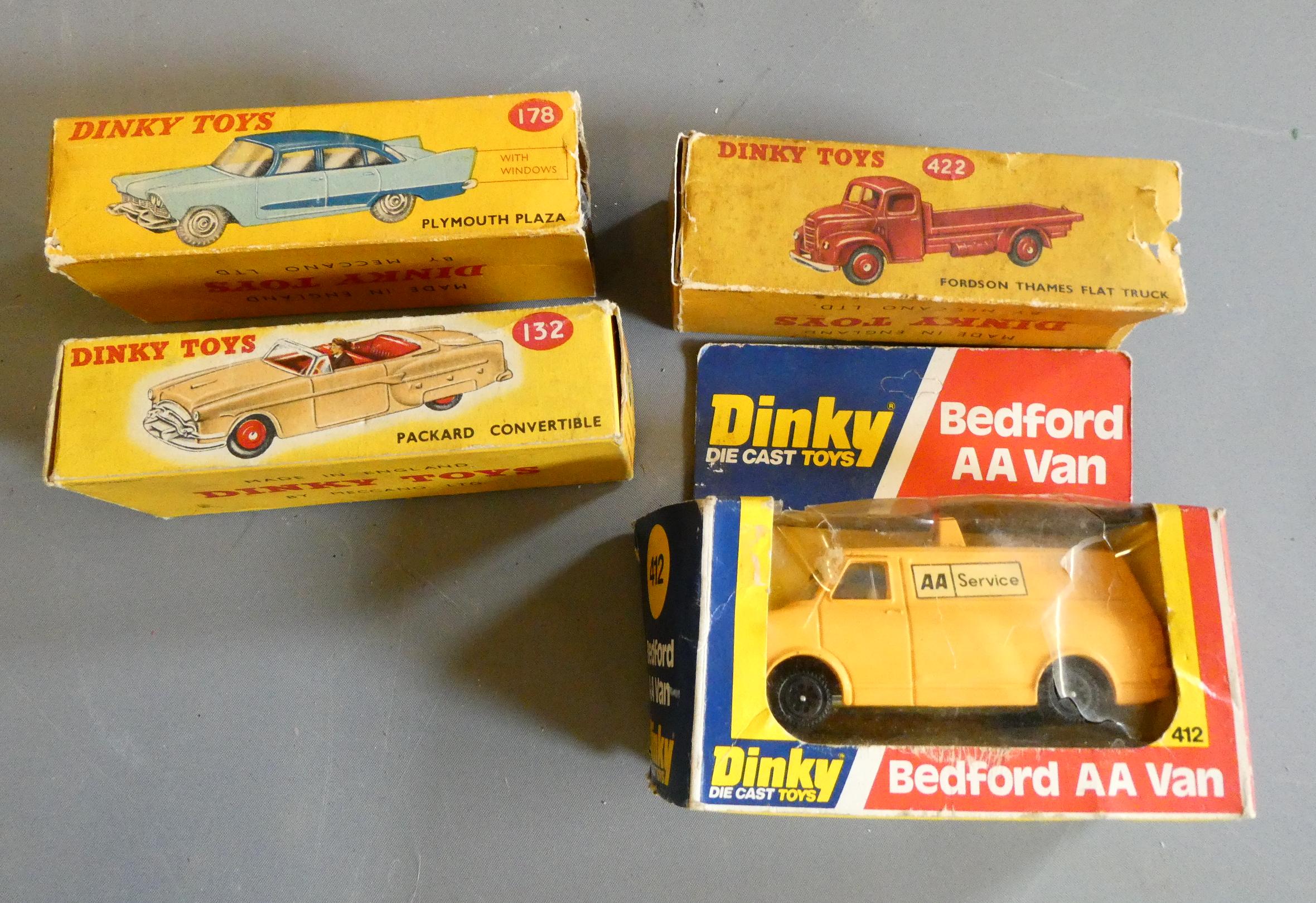 Four Dinky Vehicles comprising Ford Thames flat truck, Plymouth Plaza, Packard Convertible and Image
