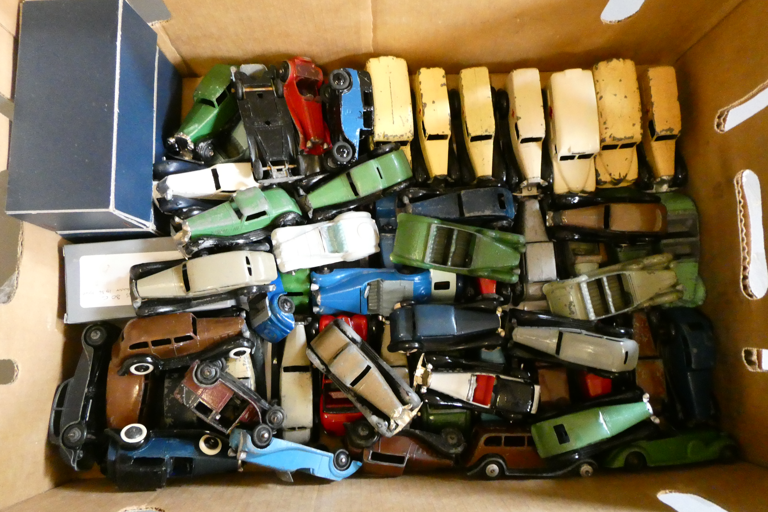 Large quantity of playworn early Dinky cars, most items repainted or have paint loss or minor damage Image