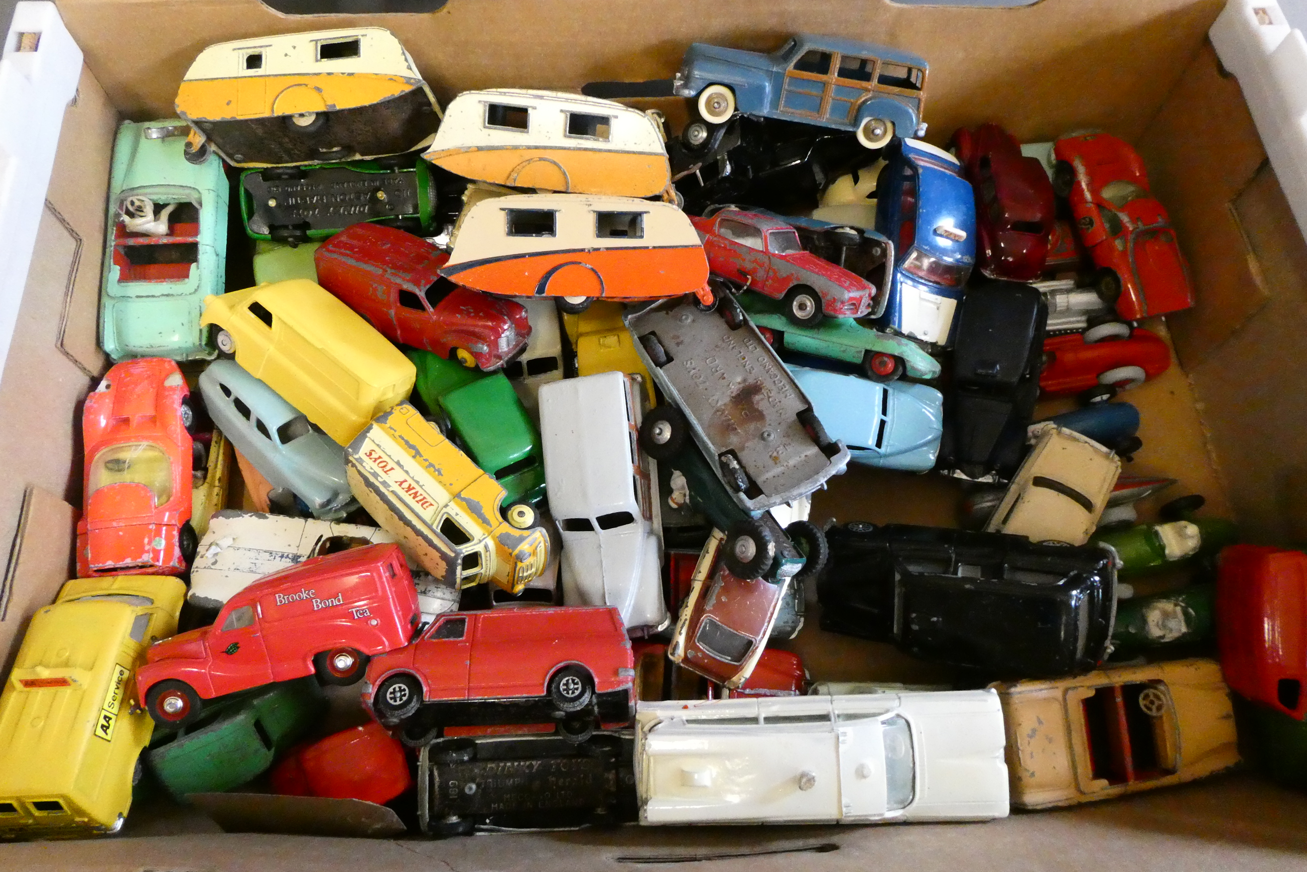 Large quantity of Playworn diecast vehicles, most items by Dinky, some overpainting, paint loss and Image