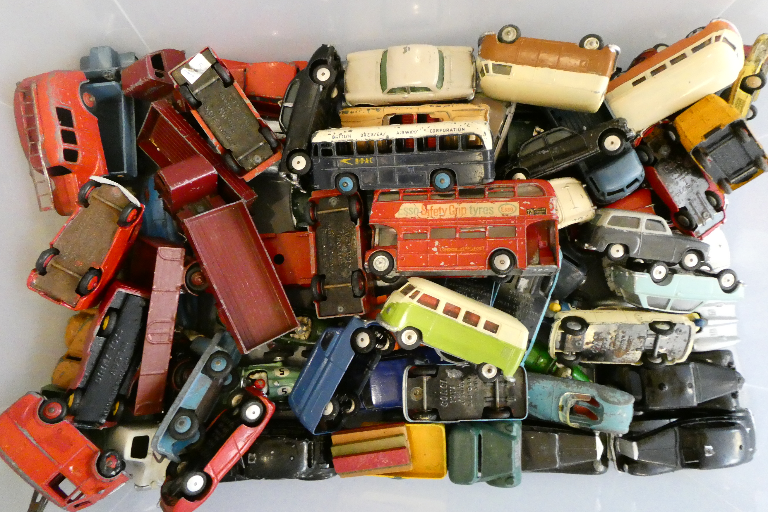 A large quantity of playworn diecast vehicles, most items by Dinky and Corgi, some overpainting, Image