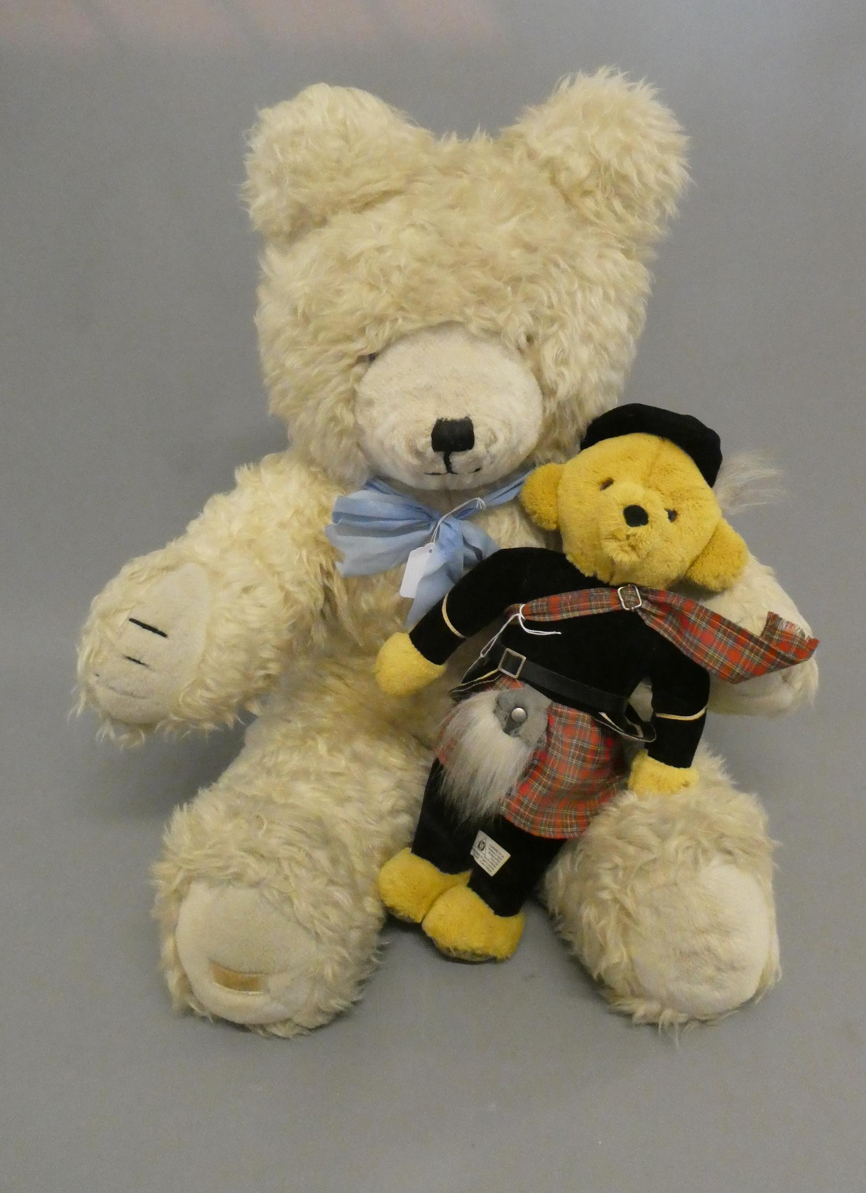 A large Wendy Boston teddy bear, with long white plush, sewn nose and amber eyes, 33 1/2" high, Image