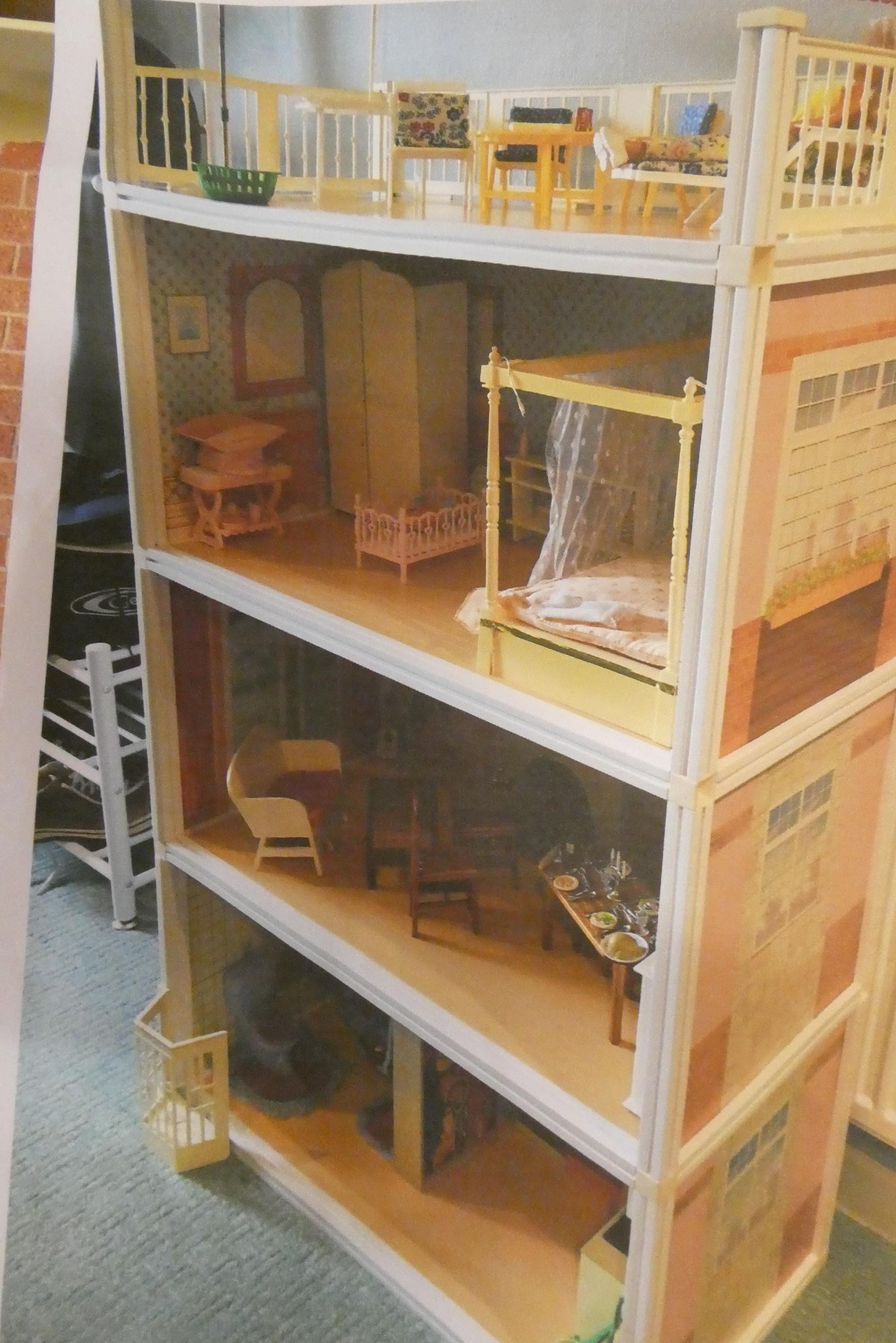 A collection of Sindy items, including one 033055X doll, a mixture of Sindy clothing, Sindy house Image