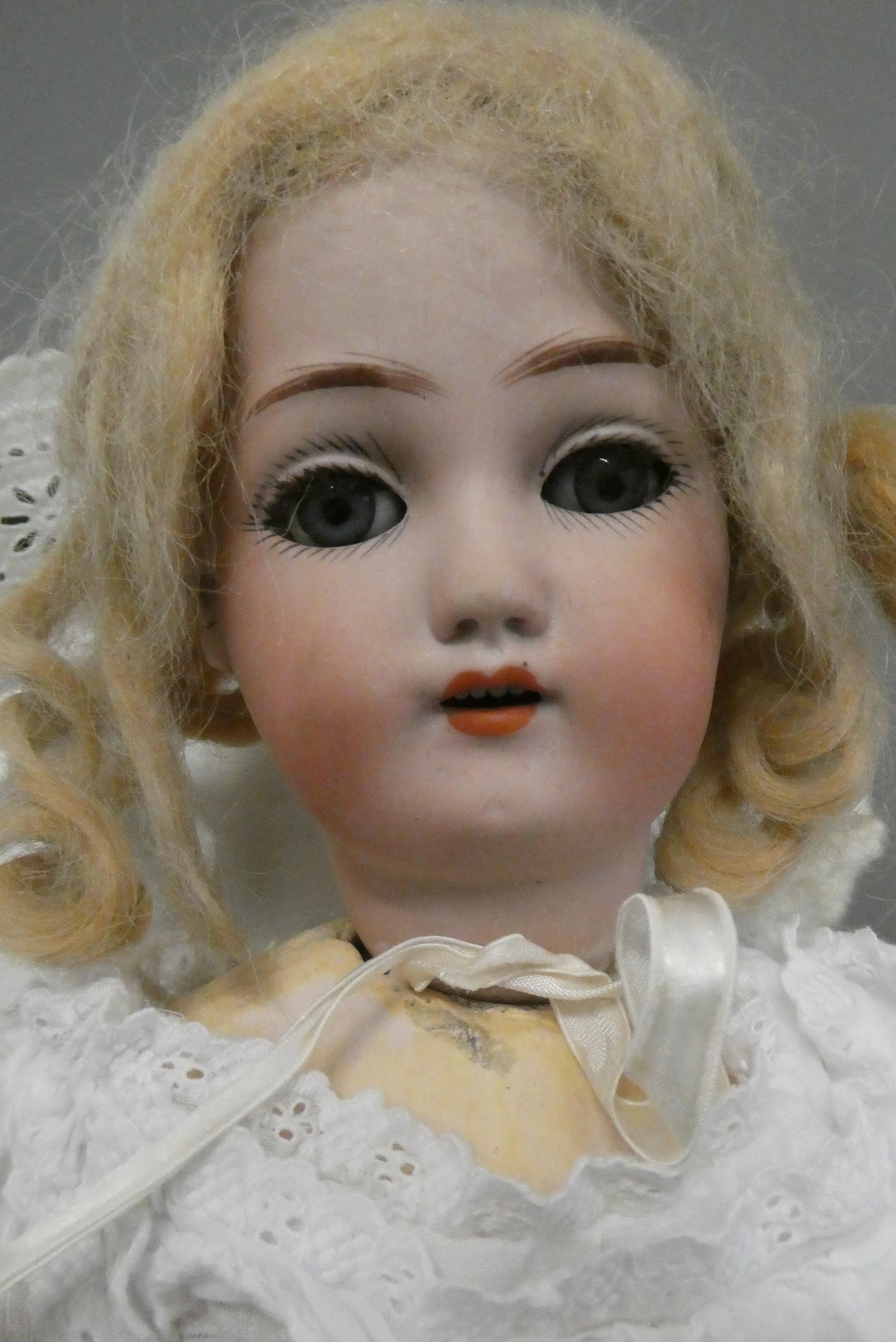 A Simon & Halbig bisque socket head doll Image