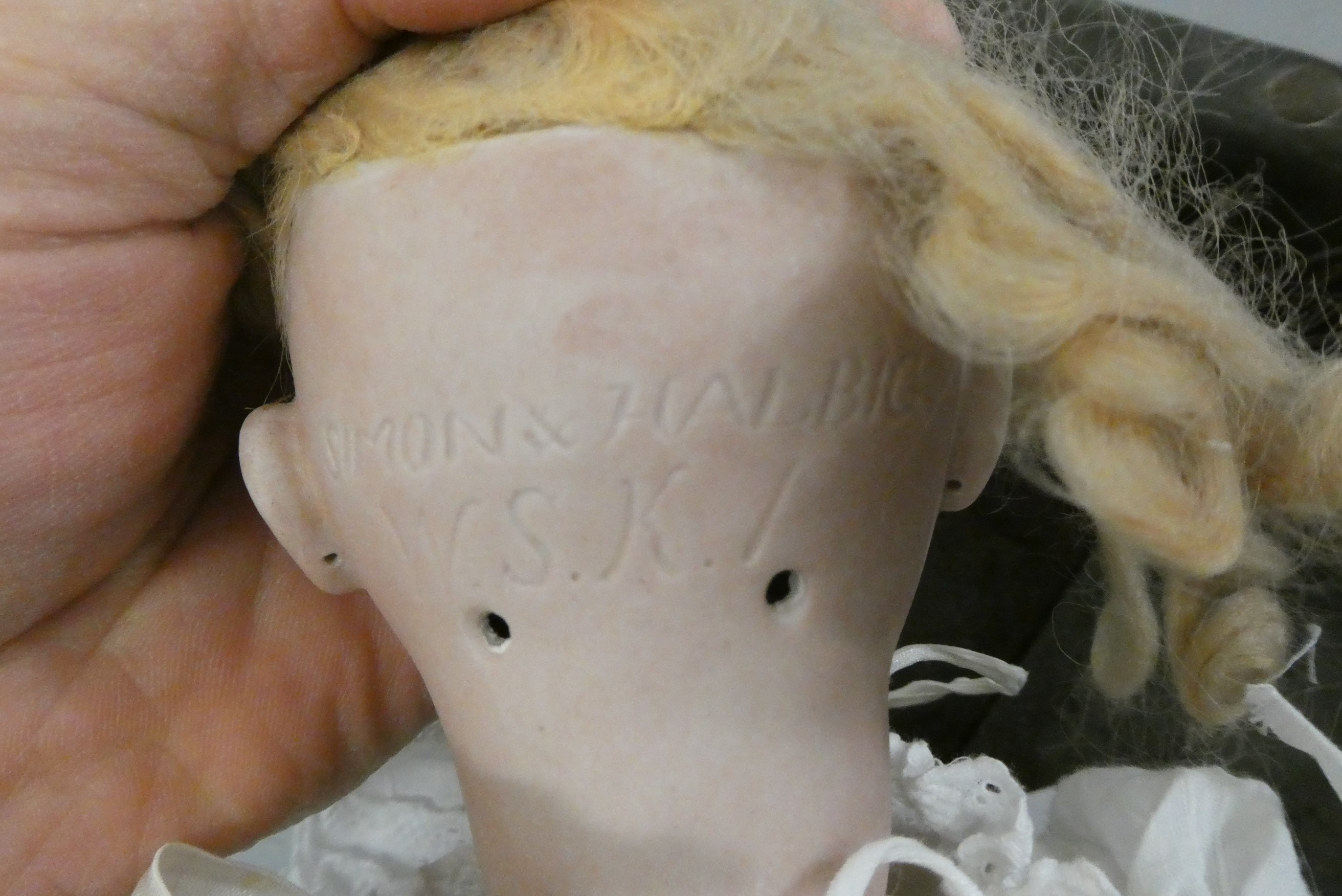 A Simon & Halbig bisque socket head doll Image