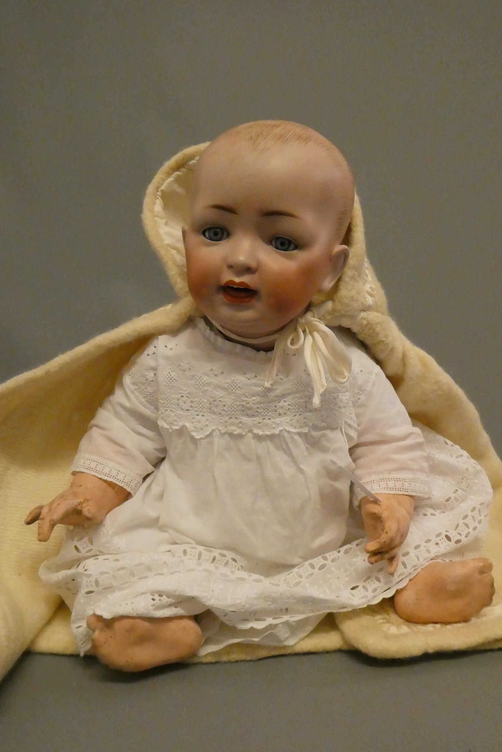 A bisque socket head character baby doll Image