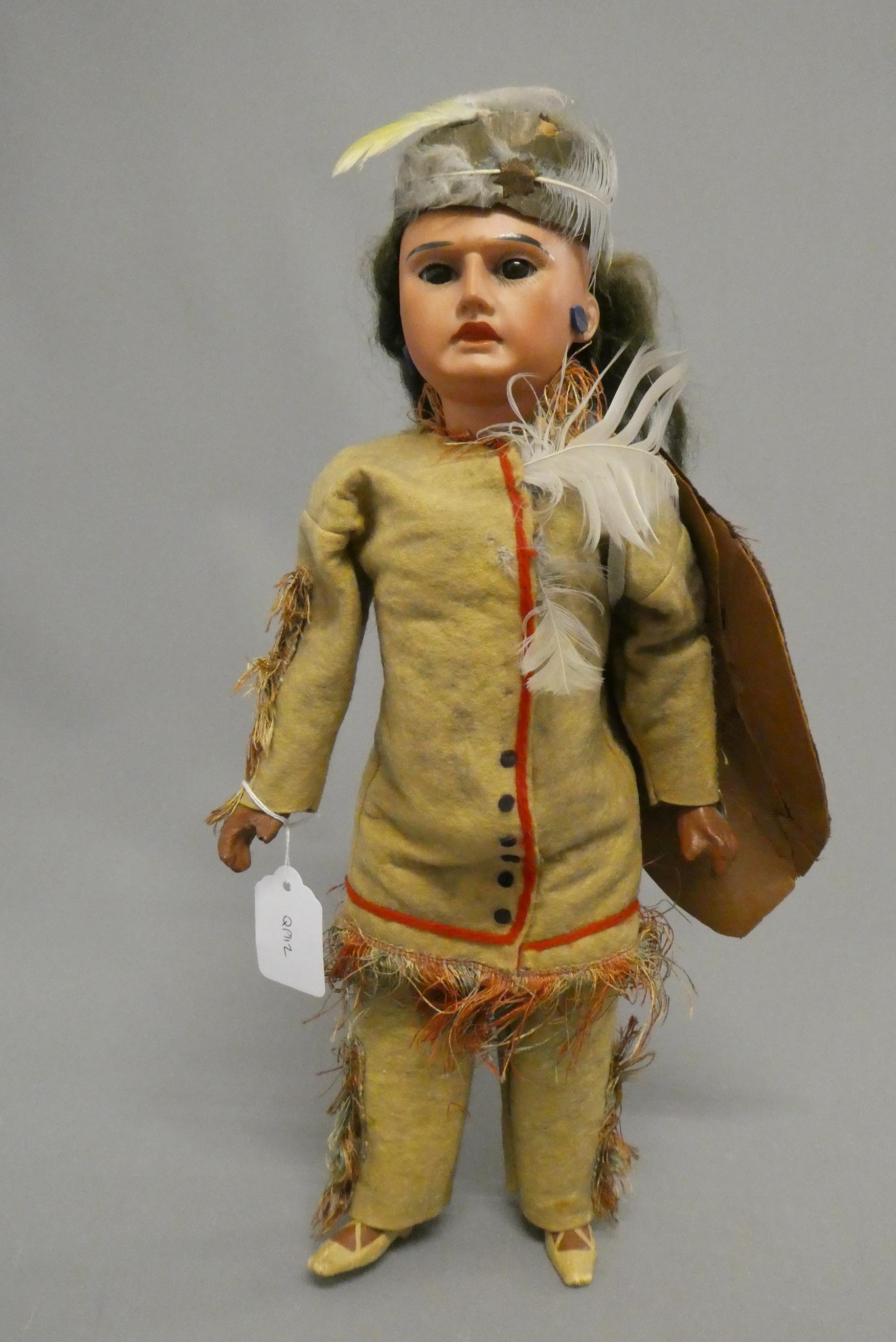 An Armand Marseille bisque socket head Native American doll Image