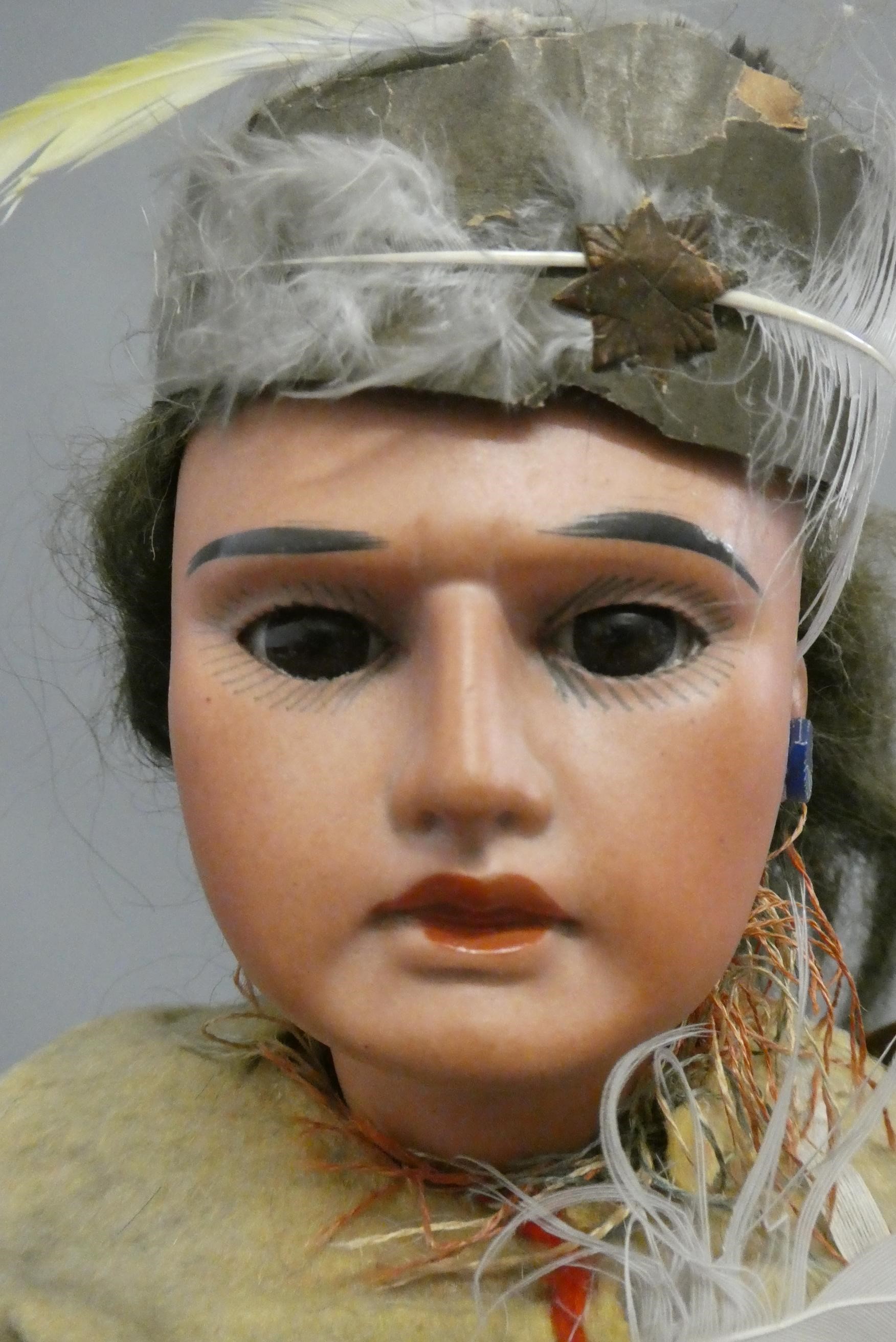 An Armand Marseille bisque socket head Native American doll Image