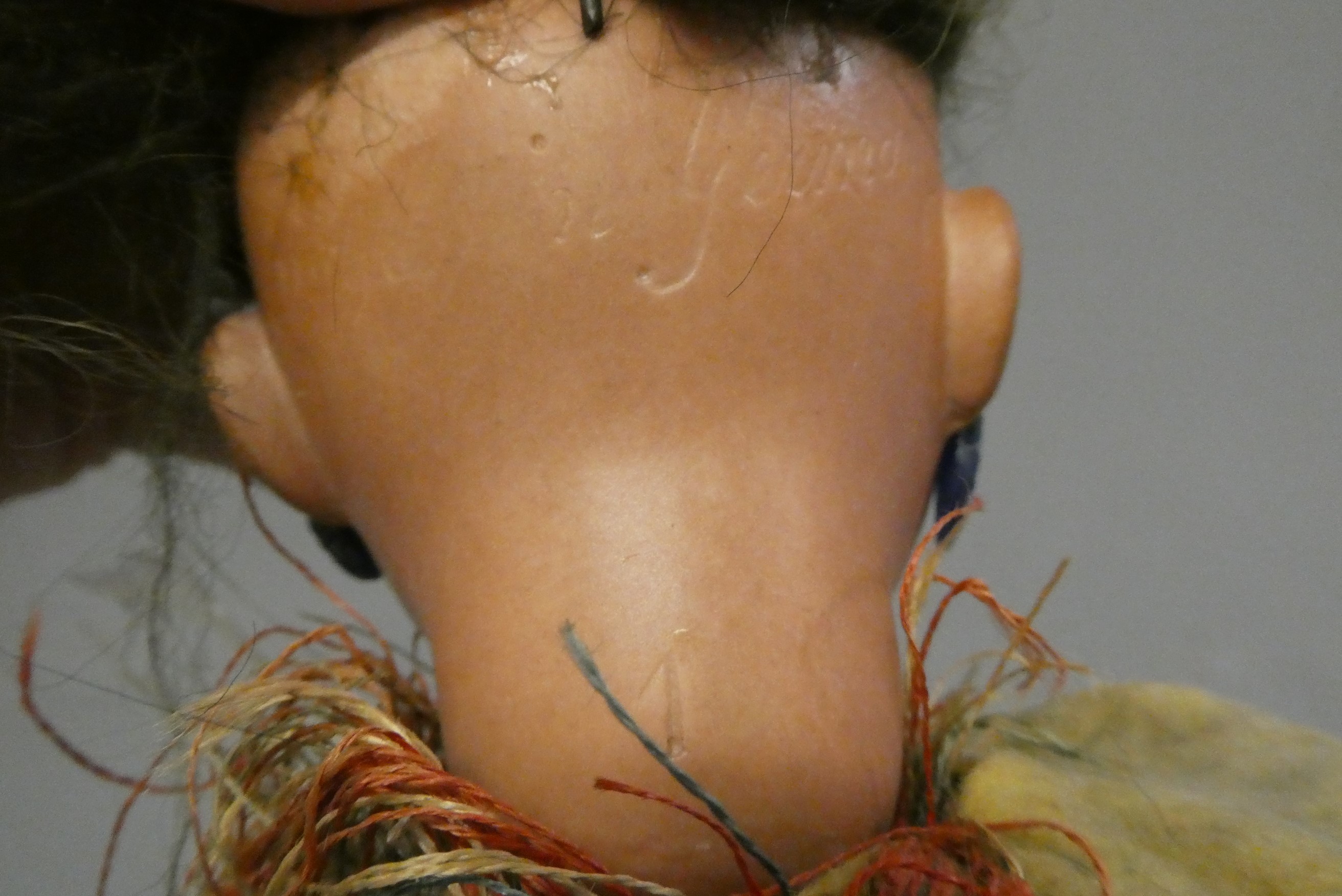 An Armand Marseille bisque socket head Native American doll Image