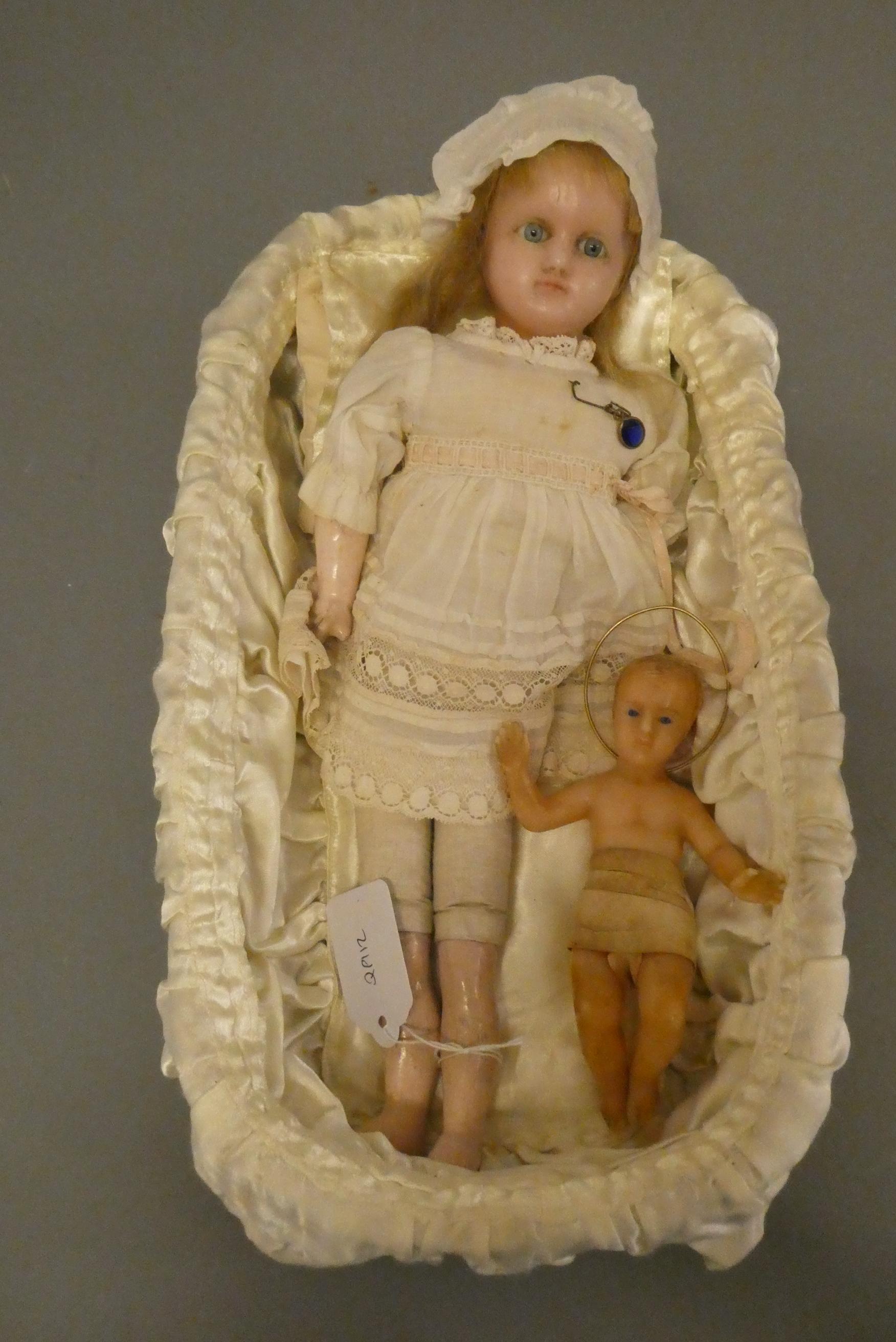Two wax head dolls Image