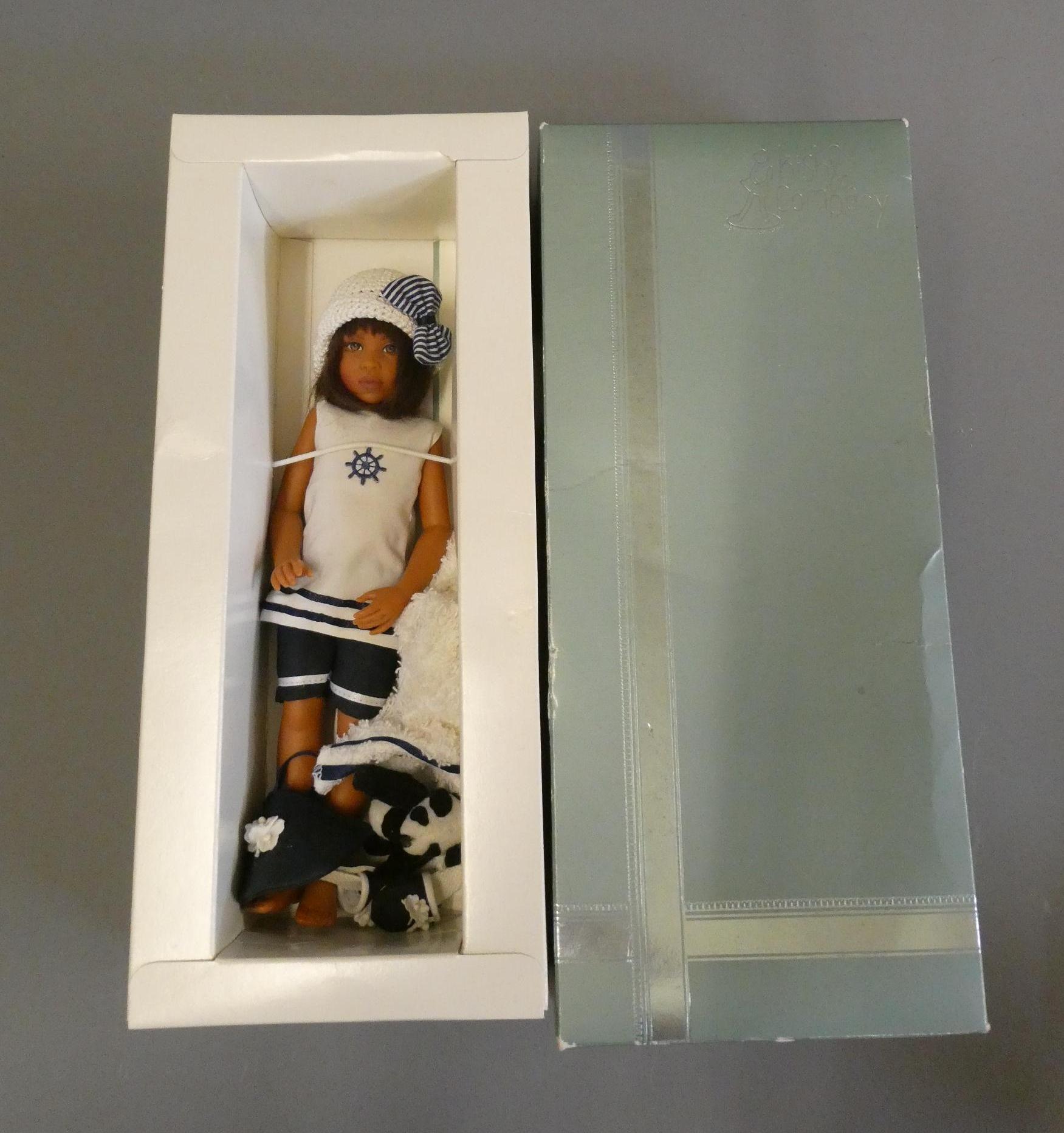 A boxed Kish & Company "Cassie - Beach Girls" doll, with full beach attire including towel, teddy Image