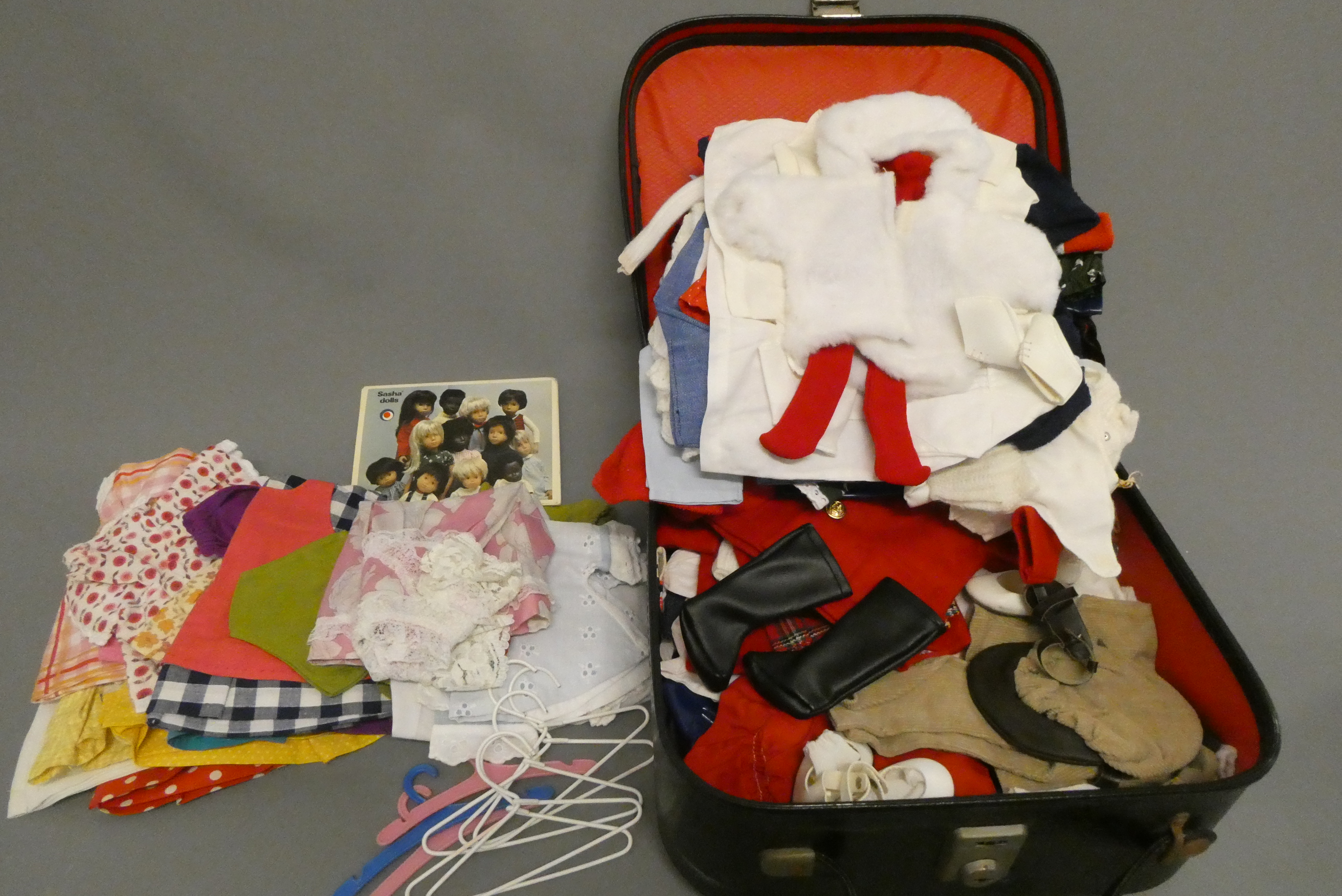 A quantity of Sasha clothing, some original and some homemade, together with postcards and coat Image