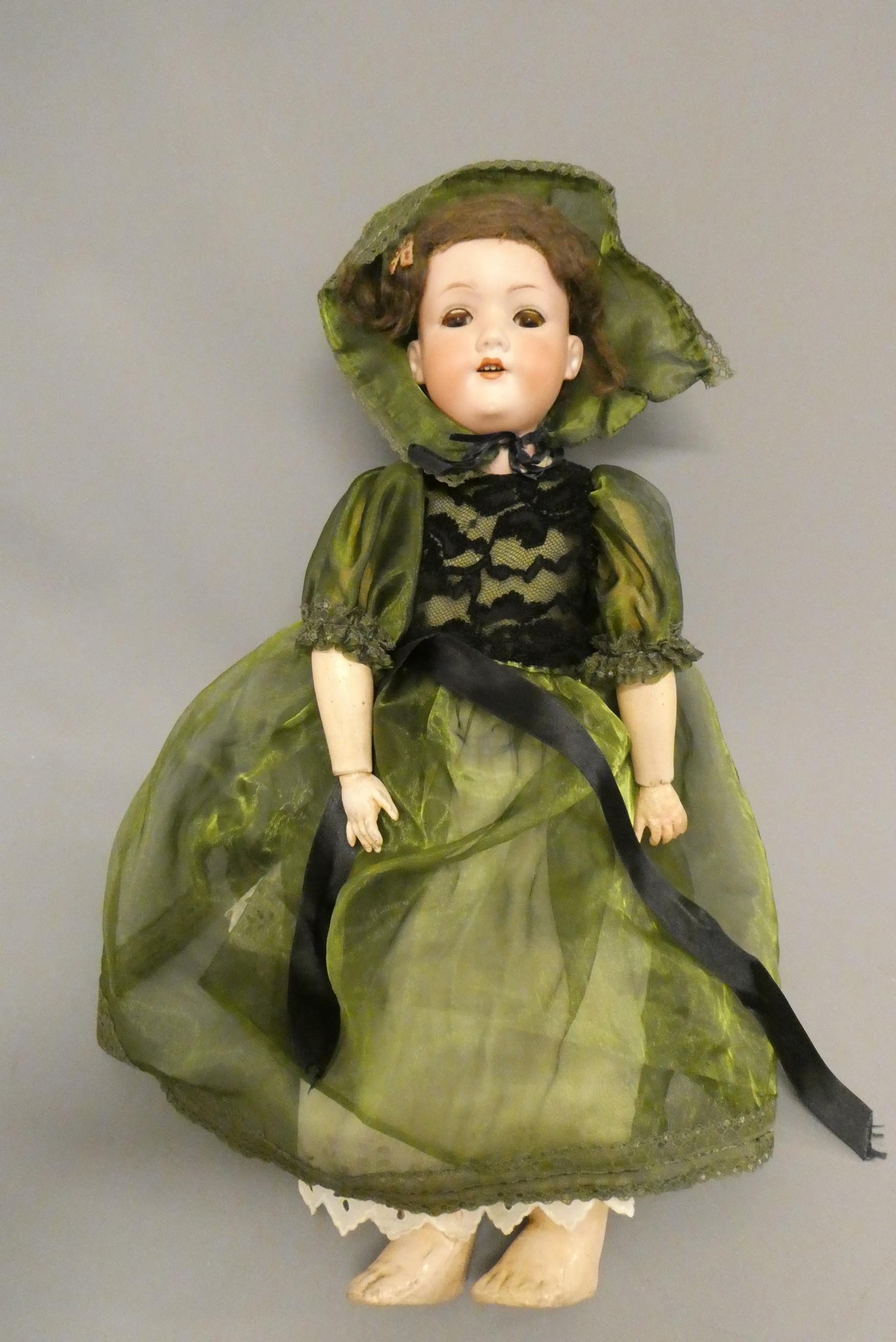 An Armand Marseille bisque socket head doll Image