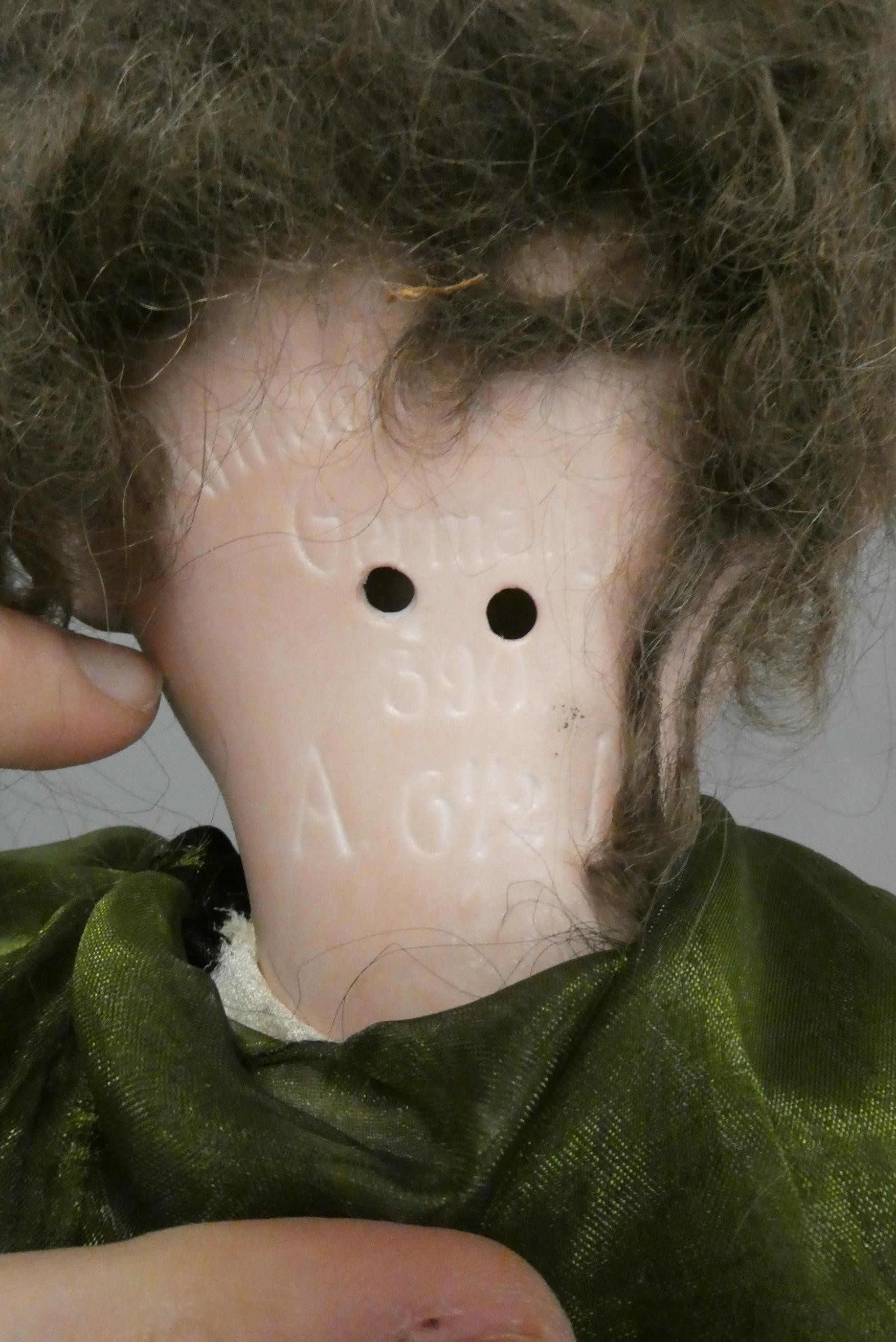 An Armand Marseille bisque socket head doll Image