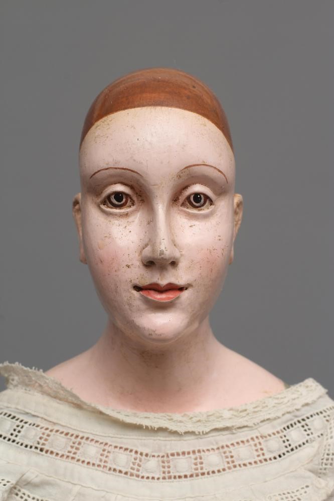 An antique standing Santos doll of jointed wood and plaster carved construction, polychrome painted, Image