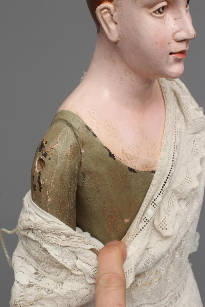 An antique standing Santos doll of jointed wood and plaster carved construction, polychrome painted, Image