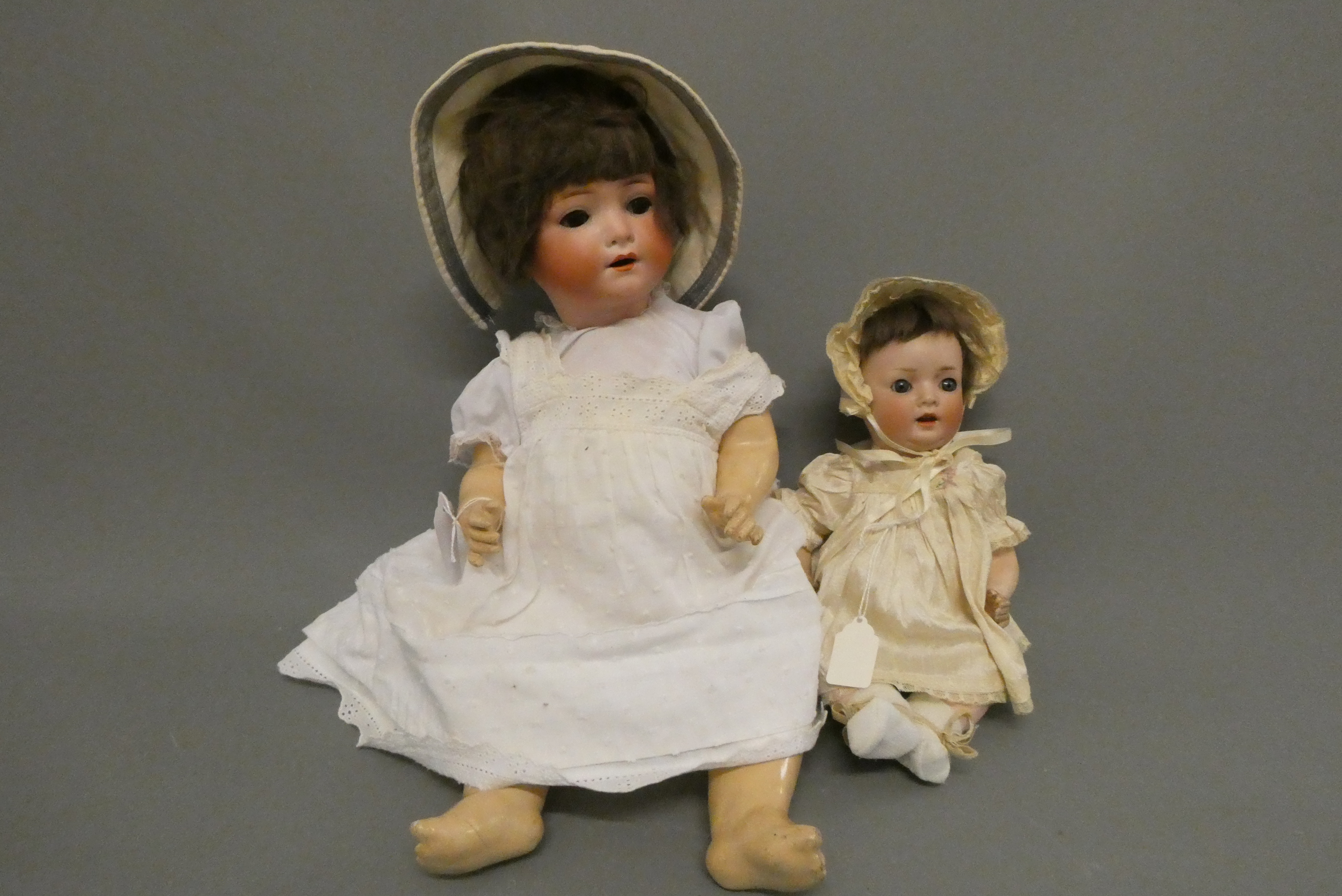 Two bisque socket head dolls Image