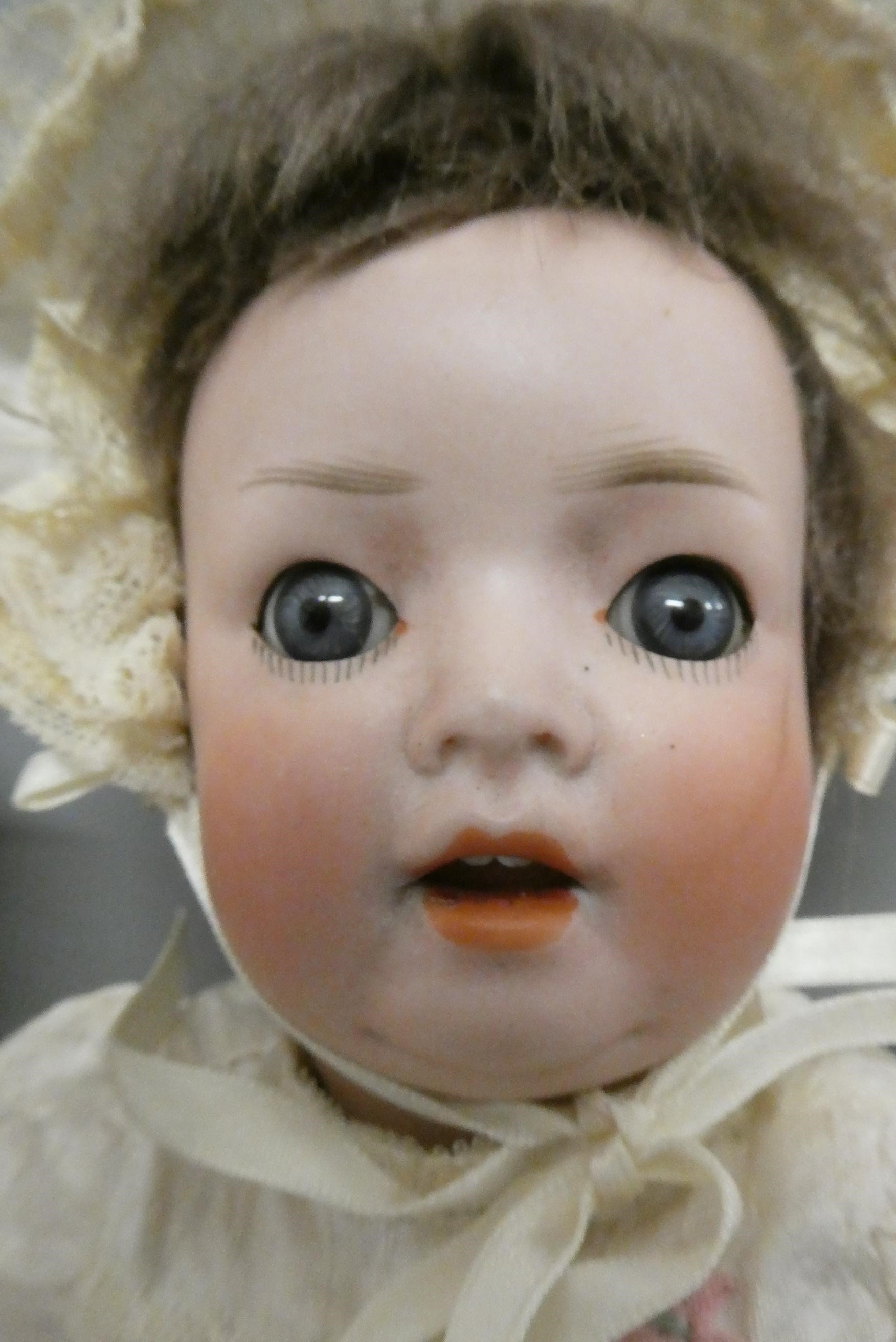 Two bisque socket head dolls Image