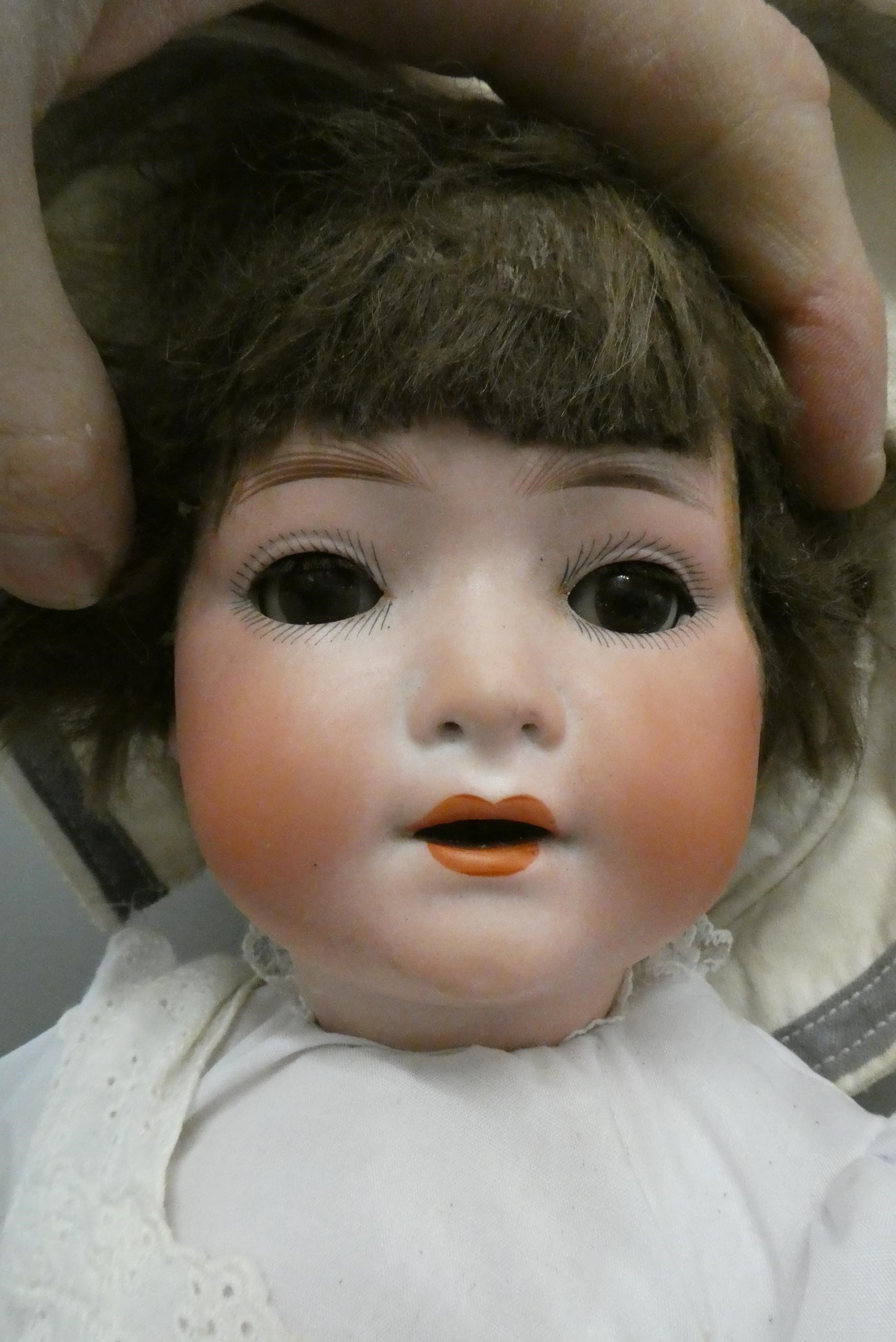 Two bisque socket head dolls Image