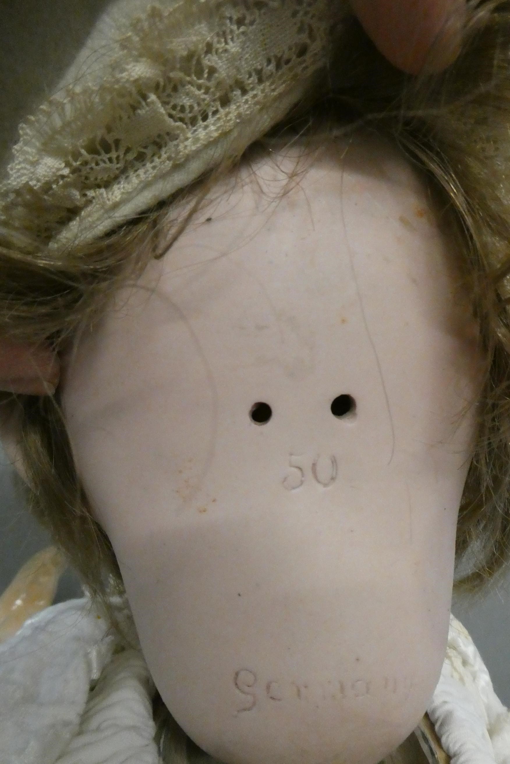 A German bisque socket head character doll Image