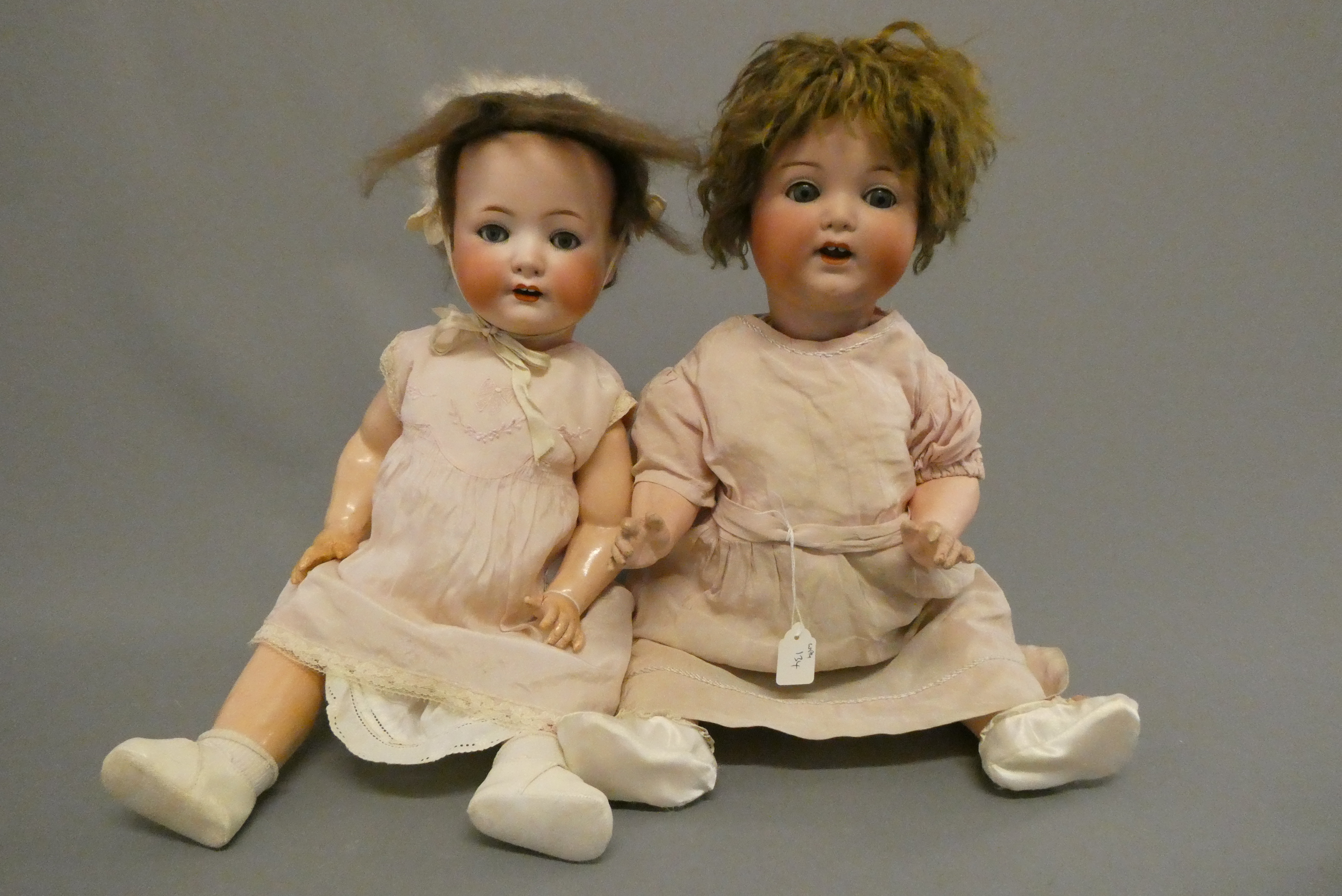 Two bisque socket head character dolls Image