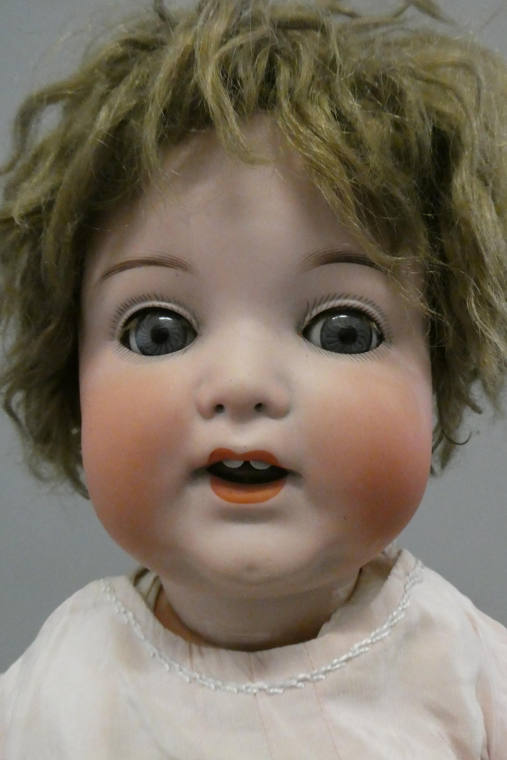Two bisque socket head character dolls Image
