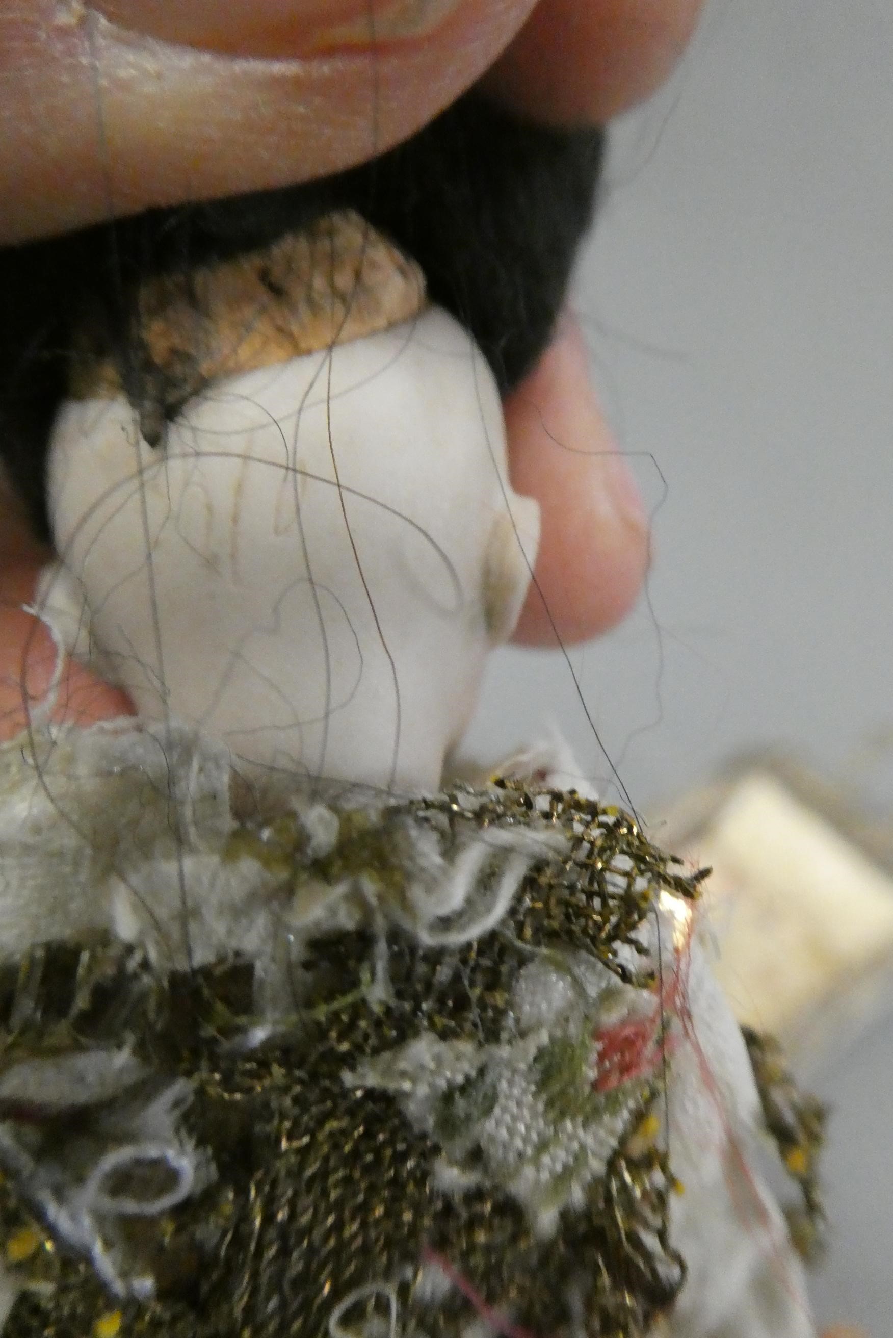 An oriental bisque socket head doll's house doll Image