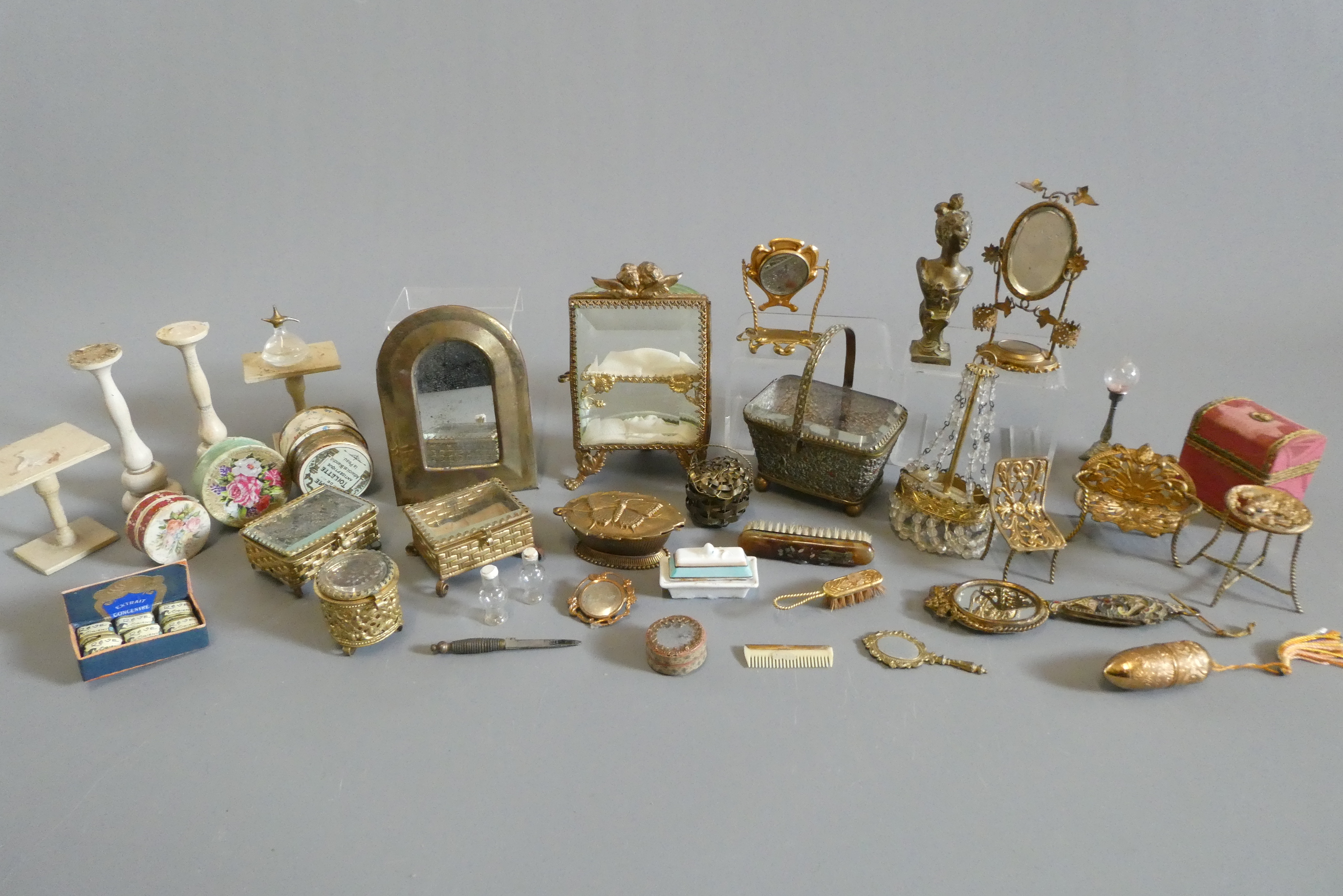 A collection of antique gilt metal doll's house furniture and accessories, together with other wood, Image