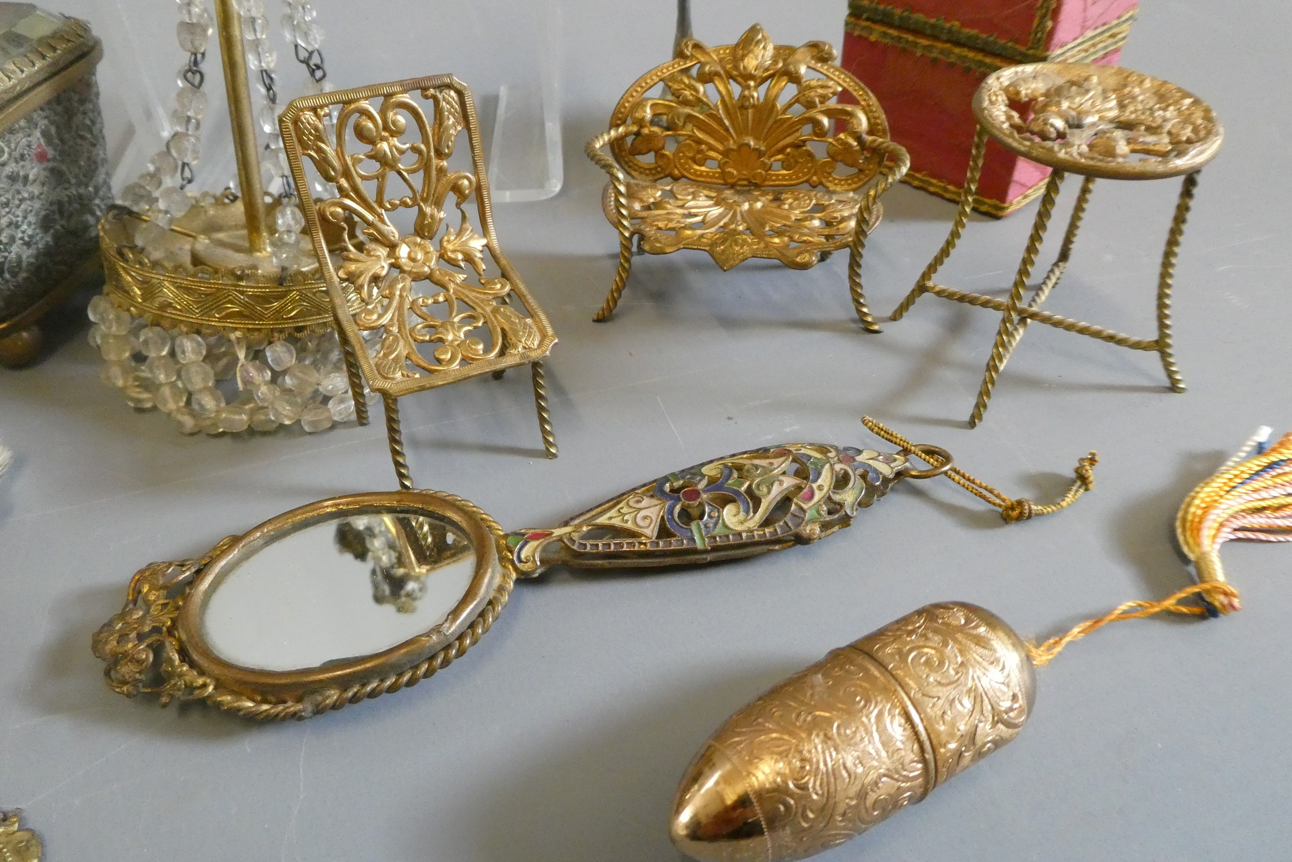 A collection of antique gilt metal doll's house furniture and accessories, together with other wood, Image