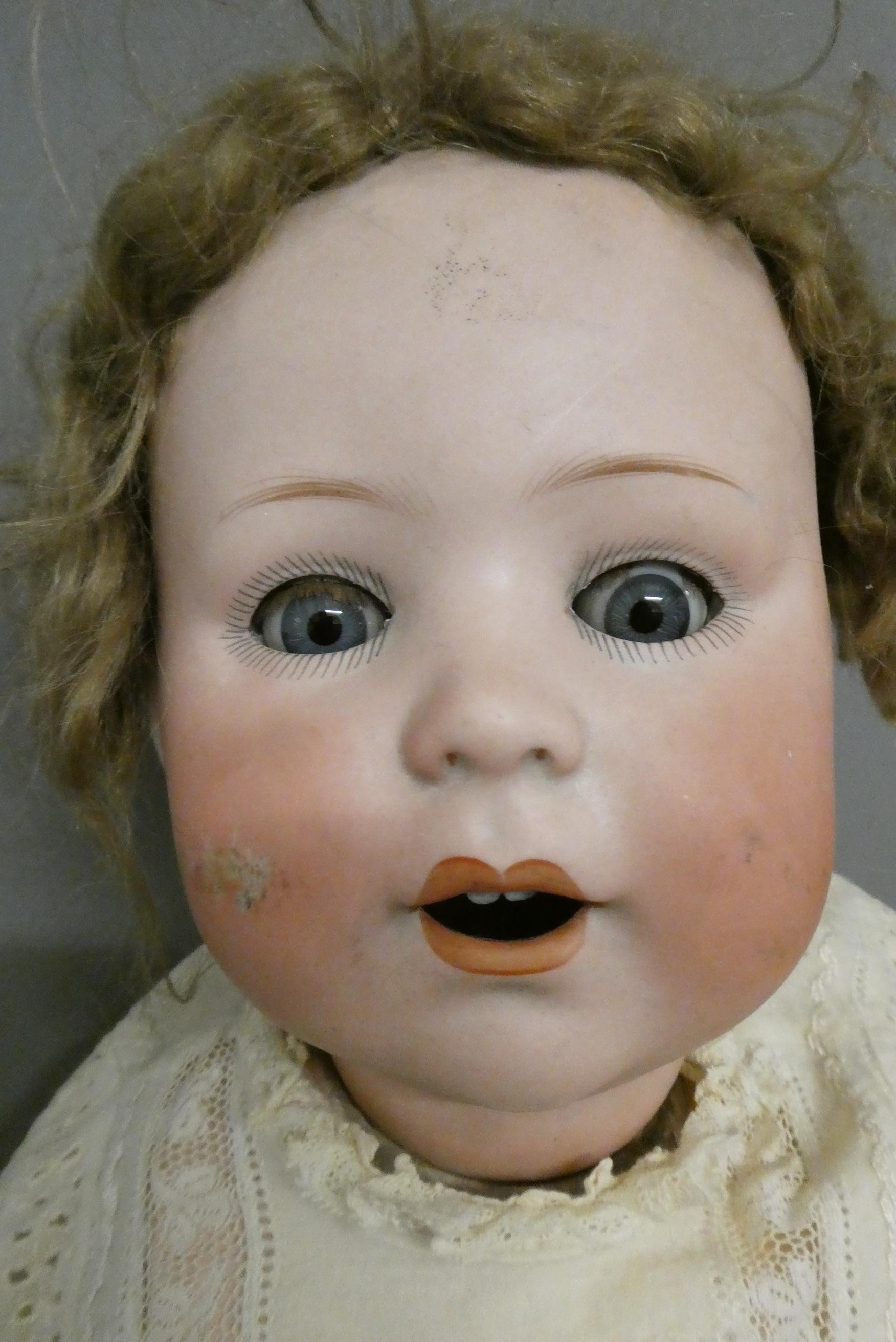 Two German bisque socket head dolls Image