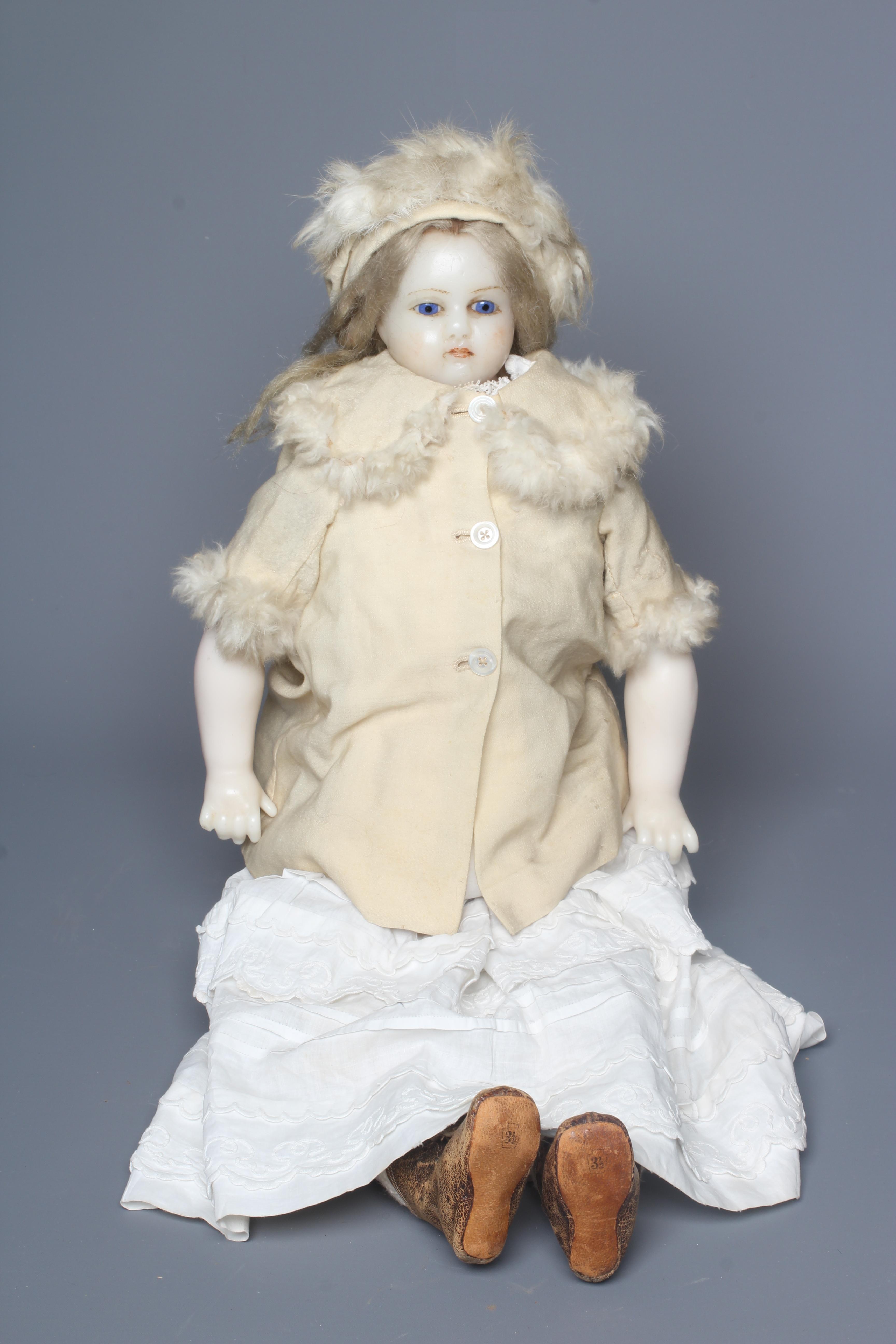 A Victorian poured wax shoulder head doll Image