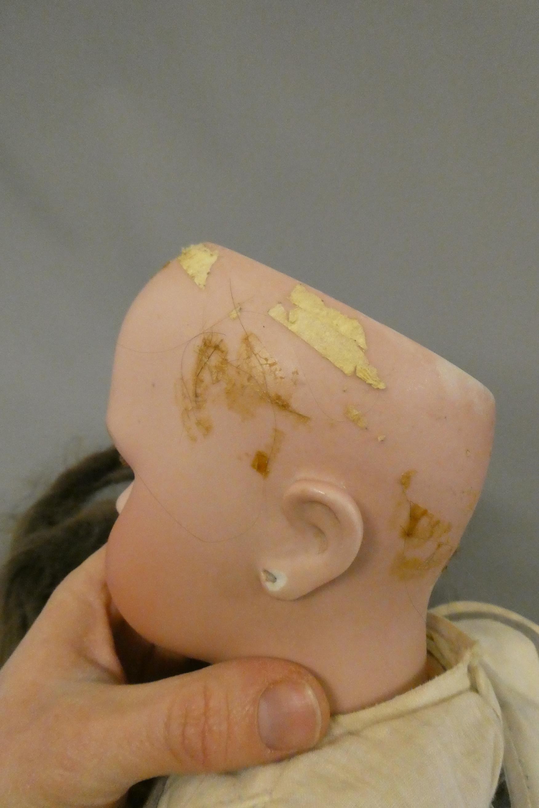 A Bebe Jumeau bisque socket head doll Image