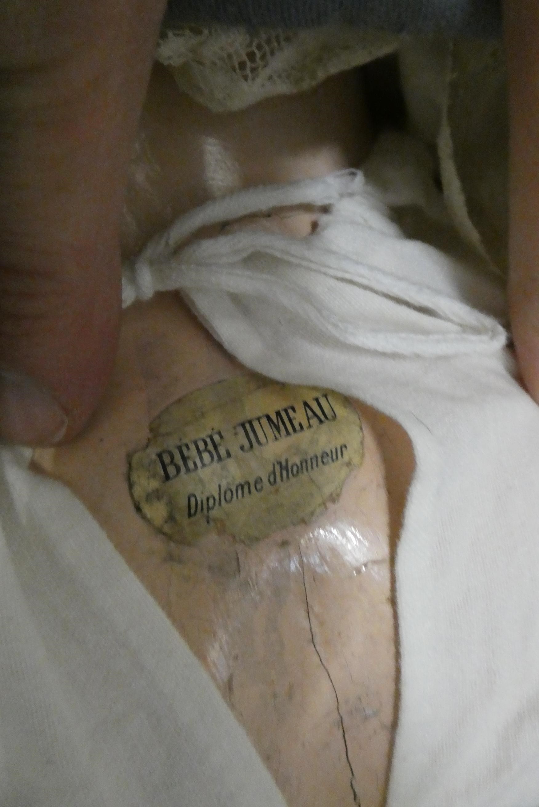 A Bebe Jumeau bisque socket head doll Image