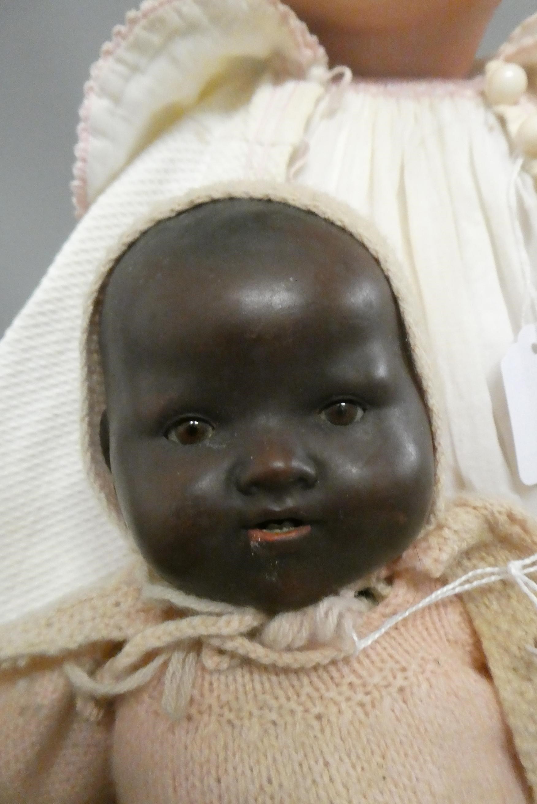 Two Armand Marseille bisque baby dolls, comprising a 23 1/2" 241-7 with sleeping eyes and open Image