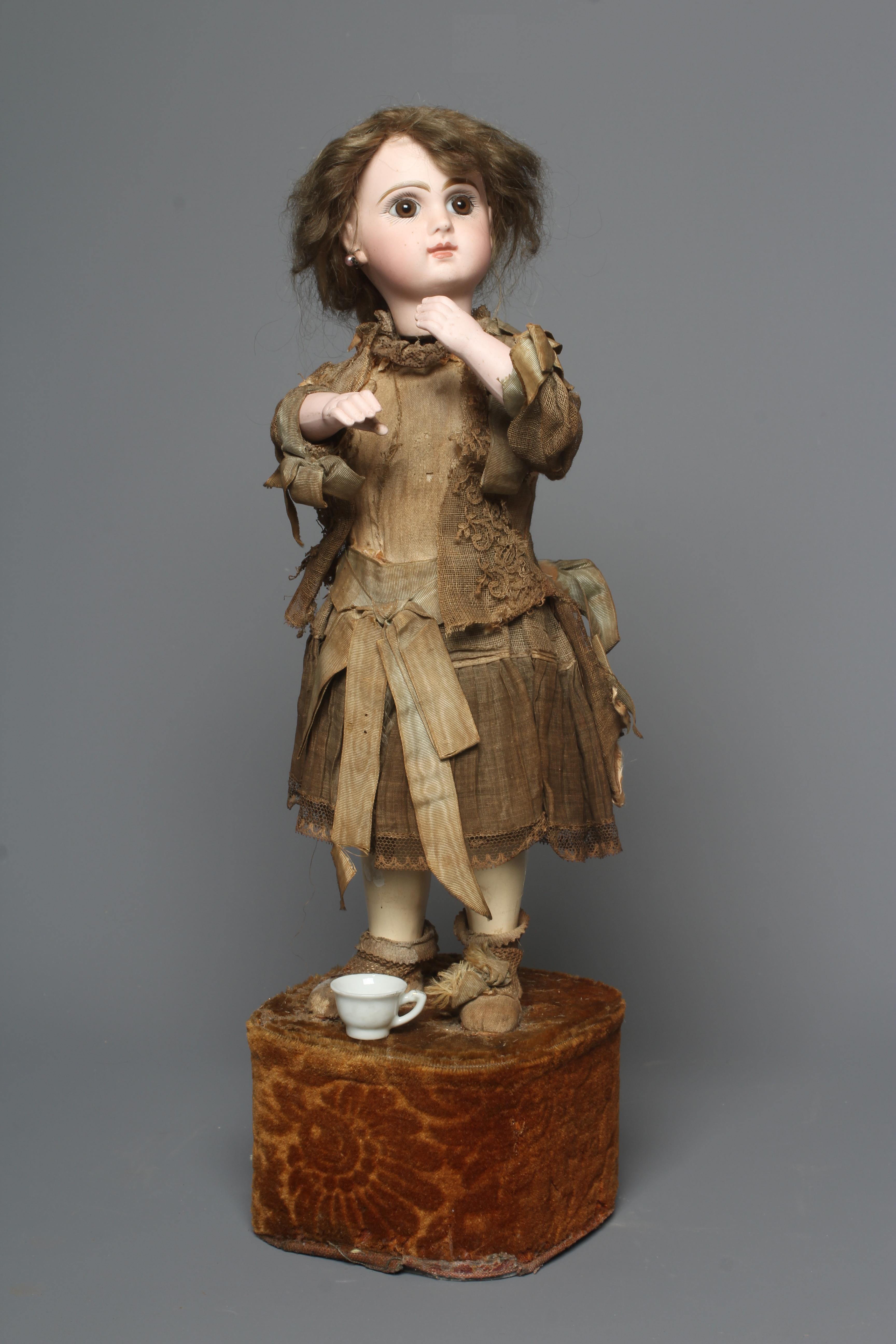 A Tete Jumeau bisque head automaton doll Image