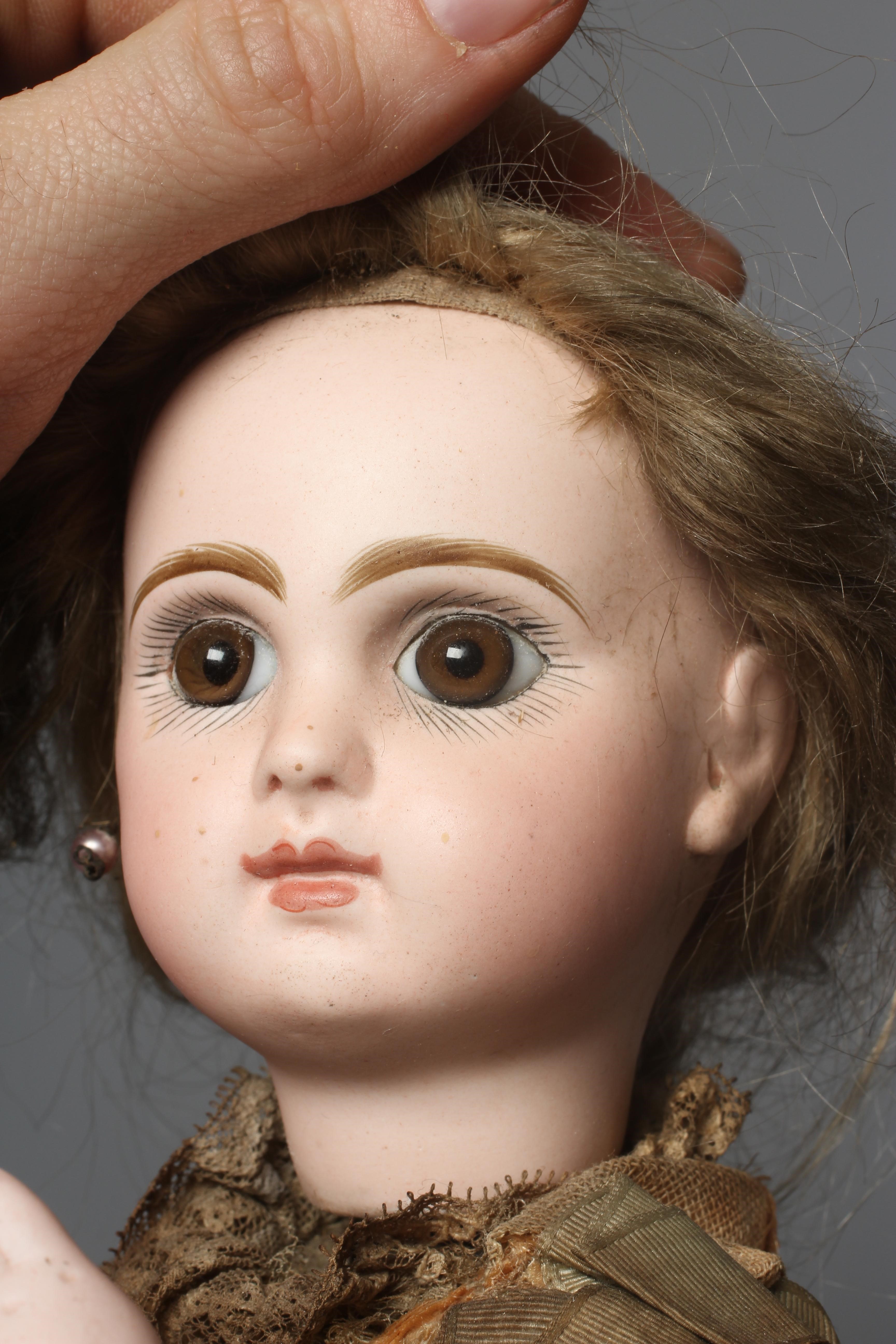 A Tete Jumeau bisque head automaton doll Image
