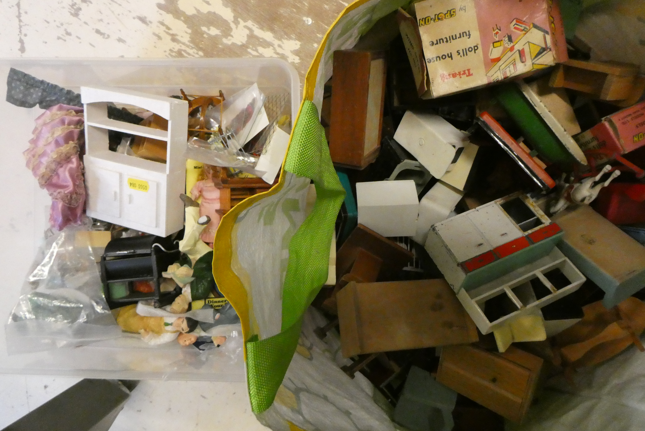 A large quantity of doll's house furniture and accessories, comprising metal, wood and plastic Image