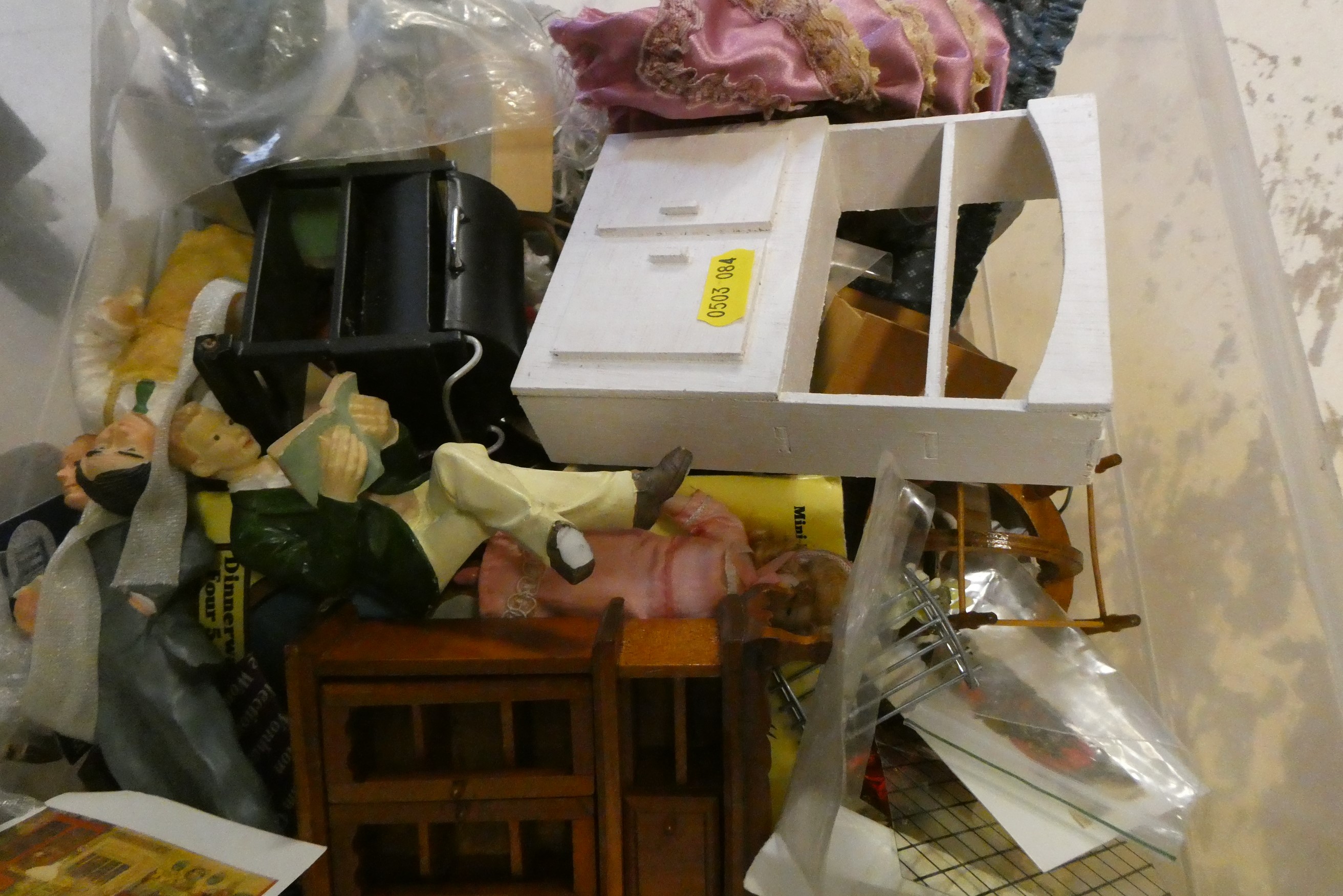 A large quantity of doll's house furniture and accessories, comprising metal, wood and plastic Image