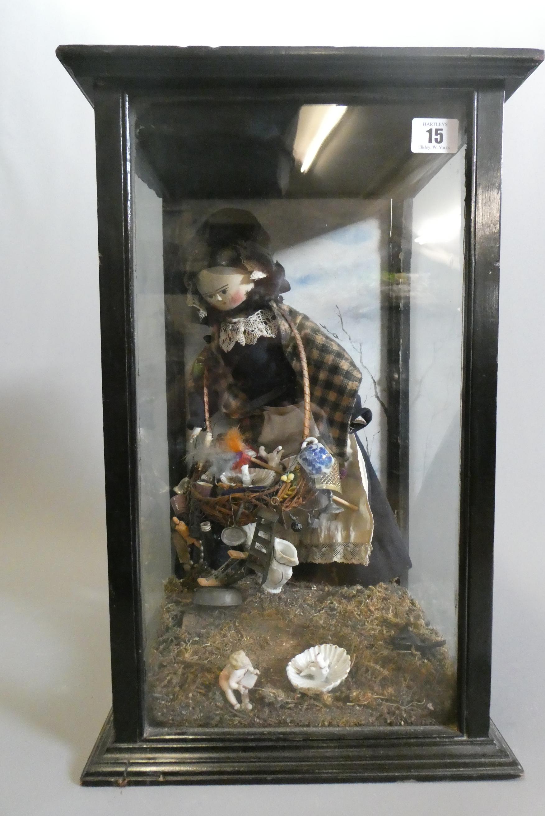 A cased haberdashery saleswoman peg doll Image