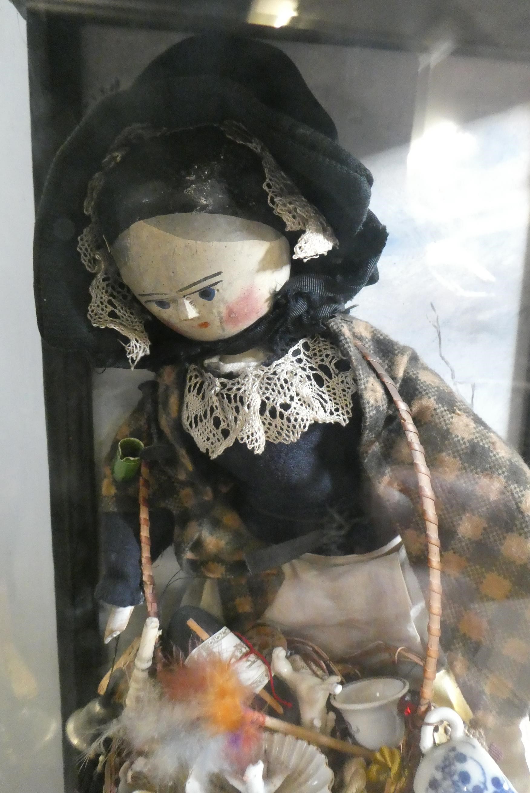 A cased haberdashery saleswoman peg doll Image