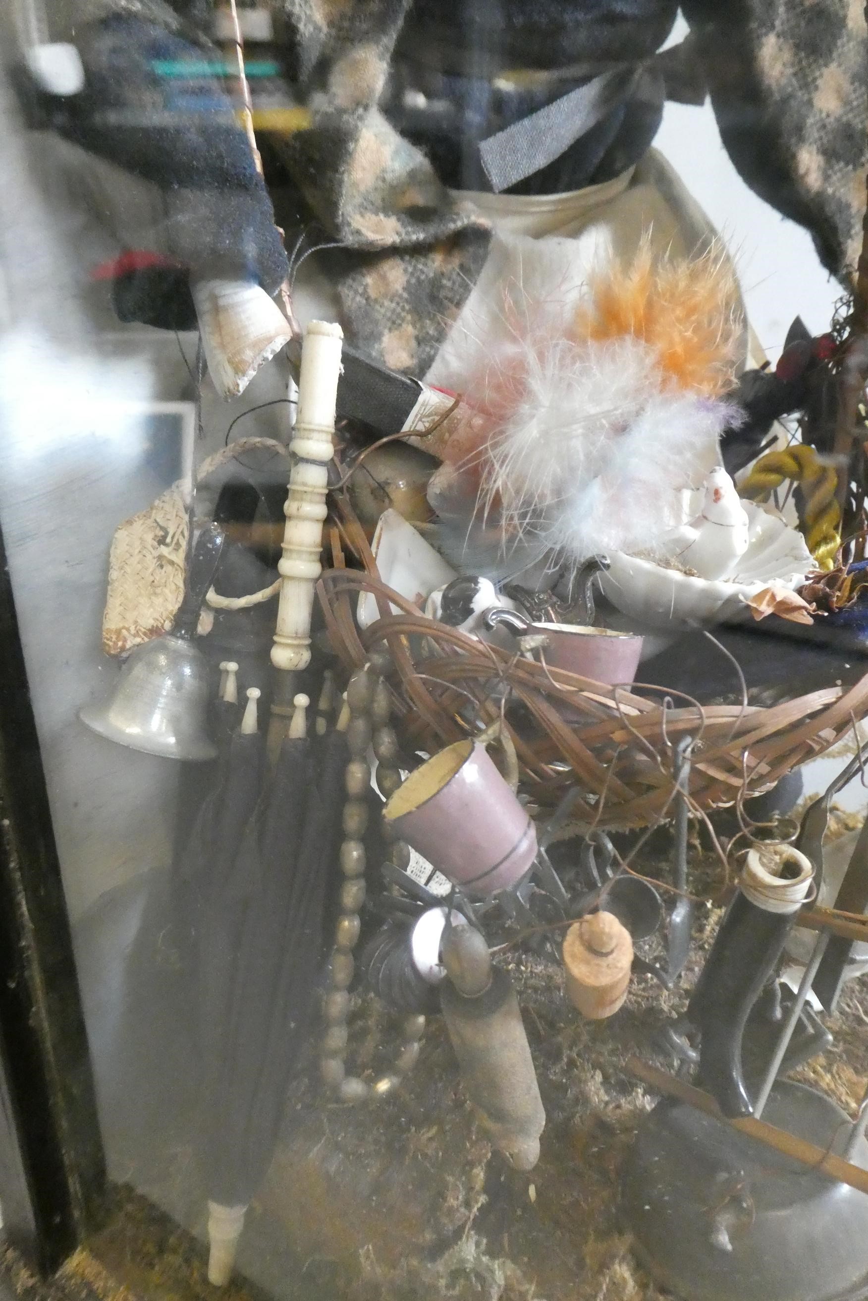 A cased haberdashery saleswoman peg doll Image