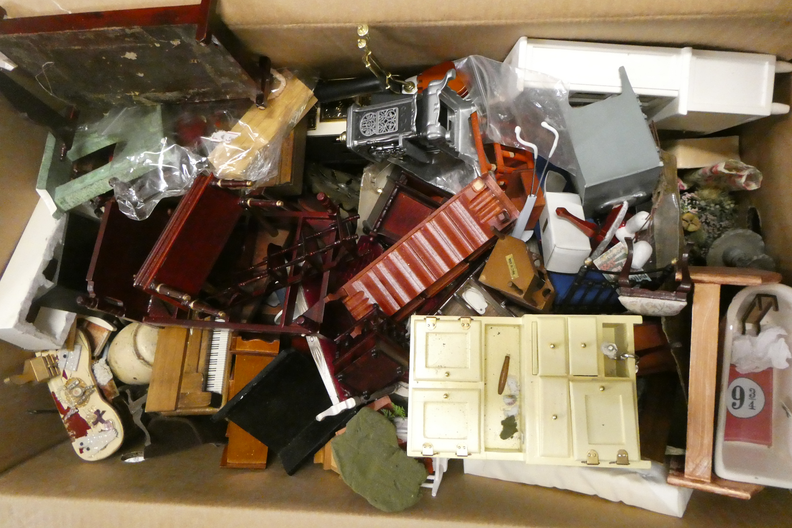 A large box of doll's house furniture and accessories, comprising modern and vintage examples with Image