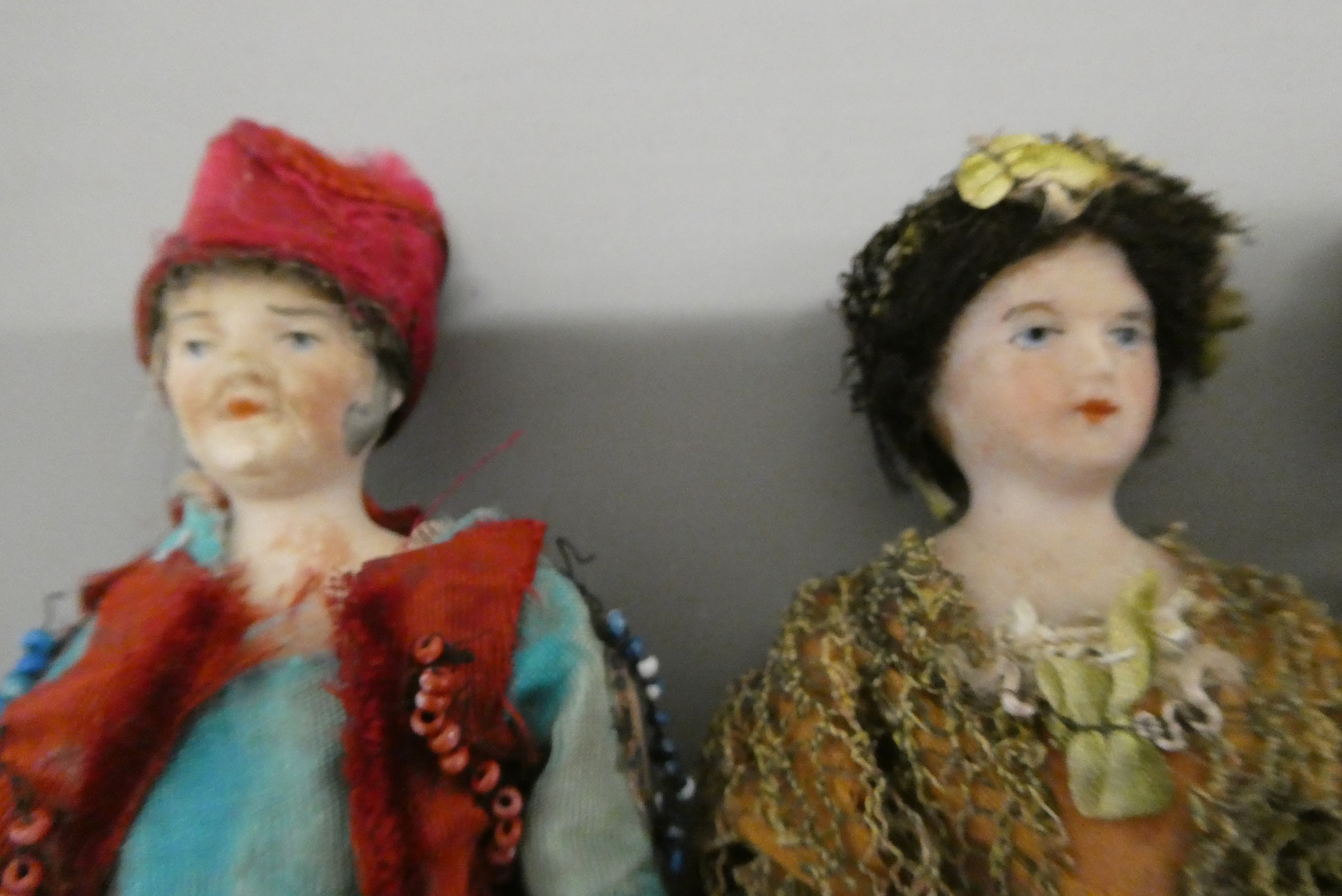 Three bisque shoulder head doll's house dolls, comprising two gentlemen and a lady, all with moulded Image