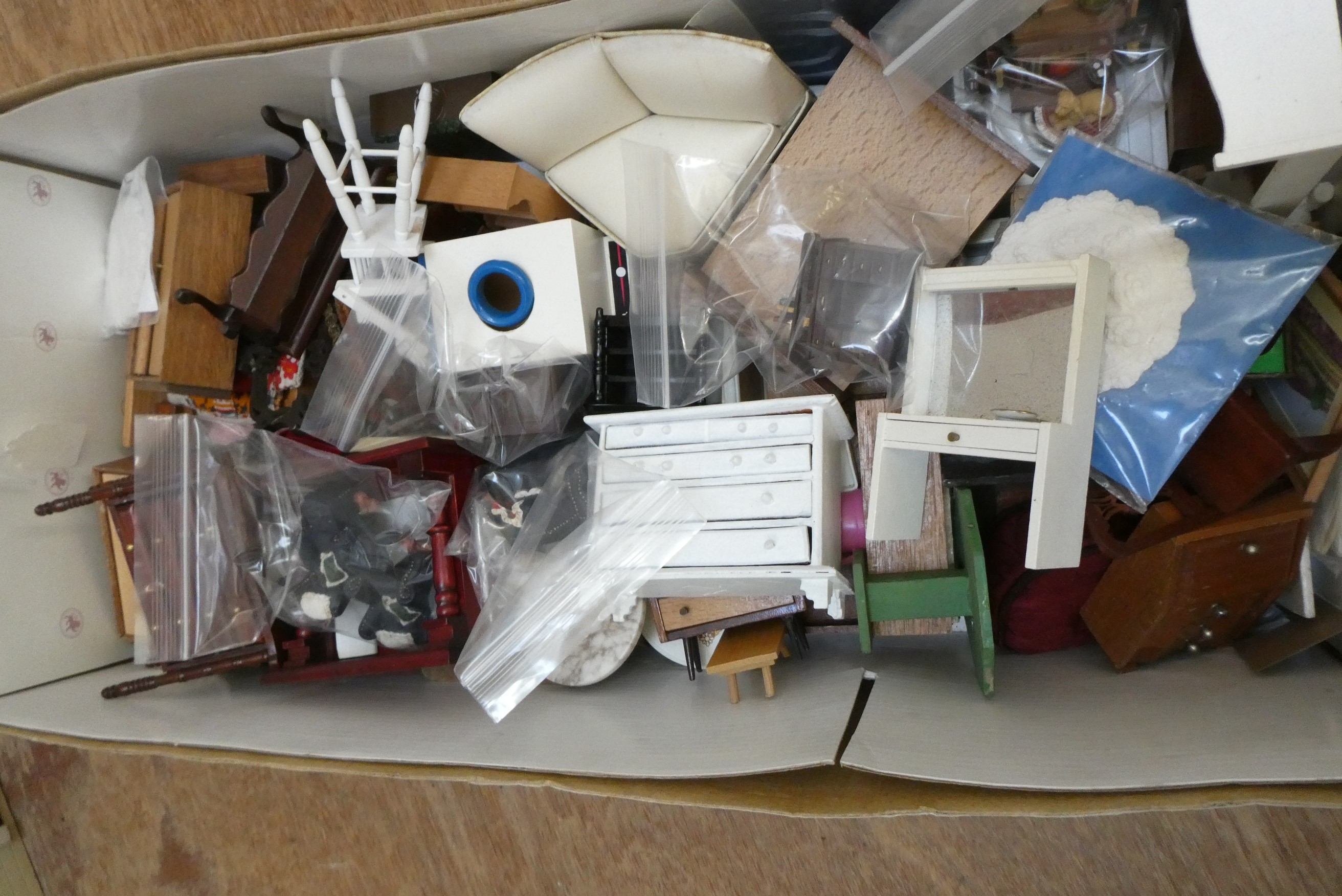 A "Tynietoy" 20th century dolls house together with a box of doll's house furniture and accessories Image