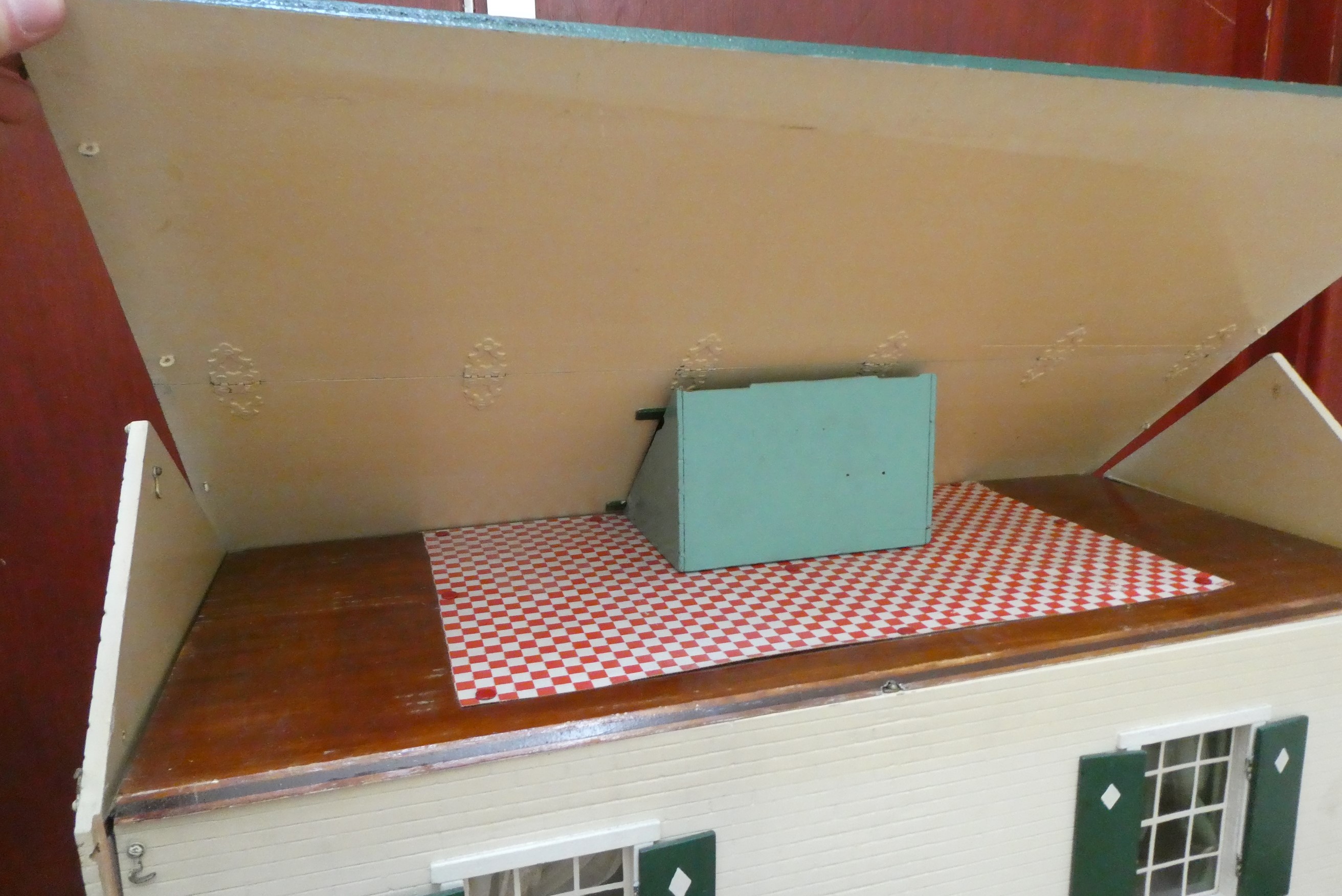 A "Tynietoy" 20th century dolls house together with a box of doll's house furniture and accessories Image