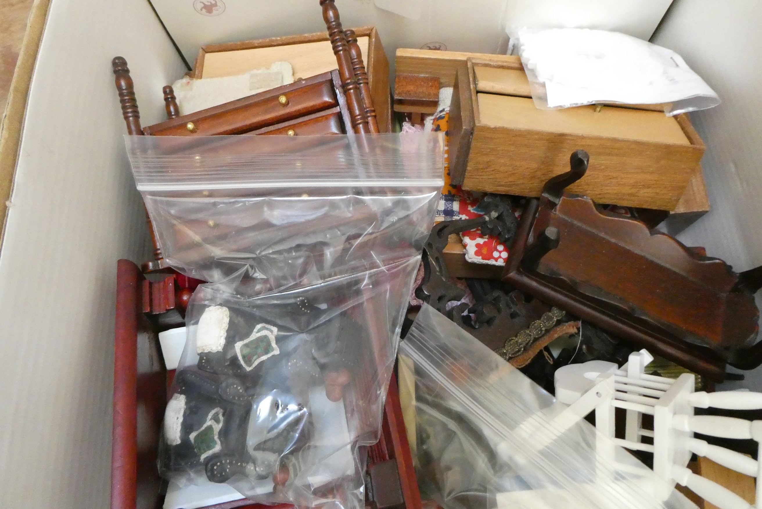 A "Tynietoy" 20th century dolls house together with a box of doll's house furniture and accessories Image