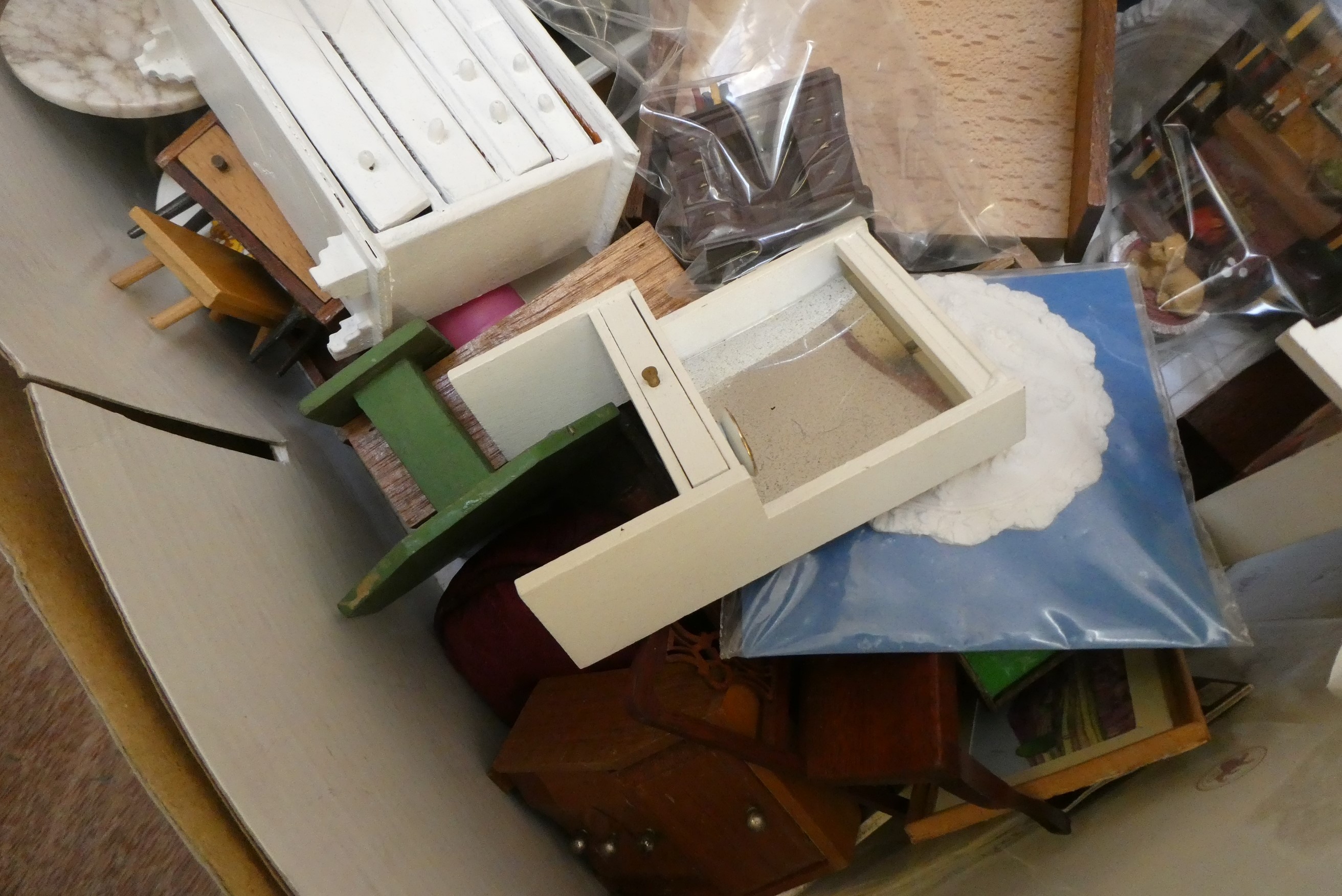 A "Tynietoy" 20th century dolls house together with a box of doll's house furniture and accessories Image