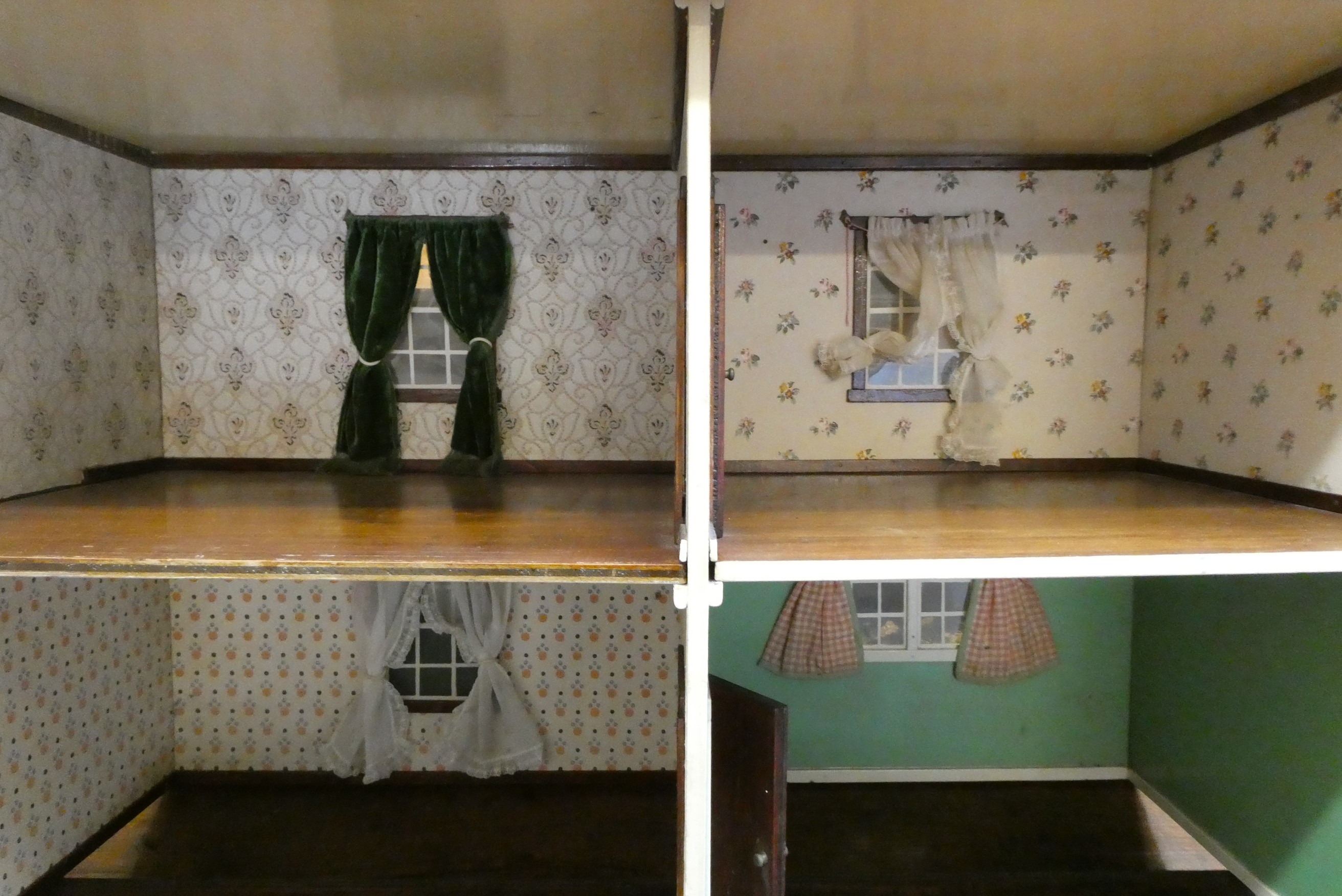 A "Tynietoy" 20th century dolls house together with a box of doll's house furniture and accessories Image